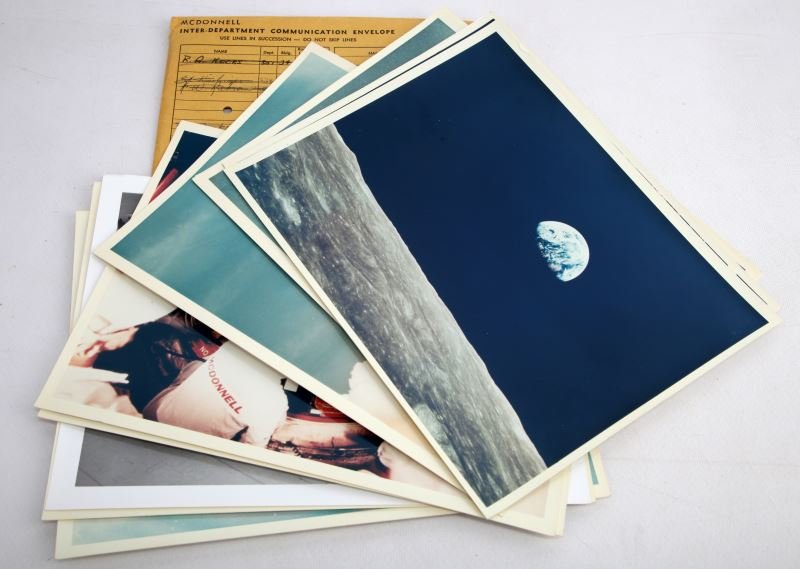 ELEVEN PHOTOGRAPHS OF GEMINI SPACE PROGRAM: This group includes pictures of the Earth from the Moon, close-up shot of the moon, technicians working on the ship, rockets taking off, photograph of two astronauts in the pilot seats before takeoff,