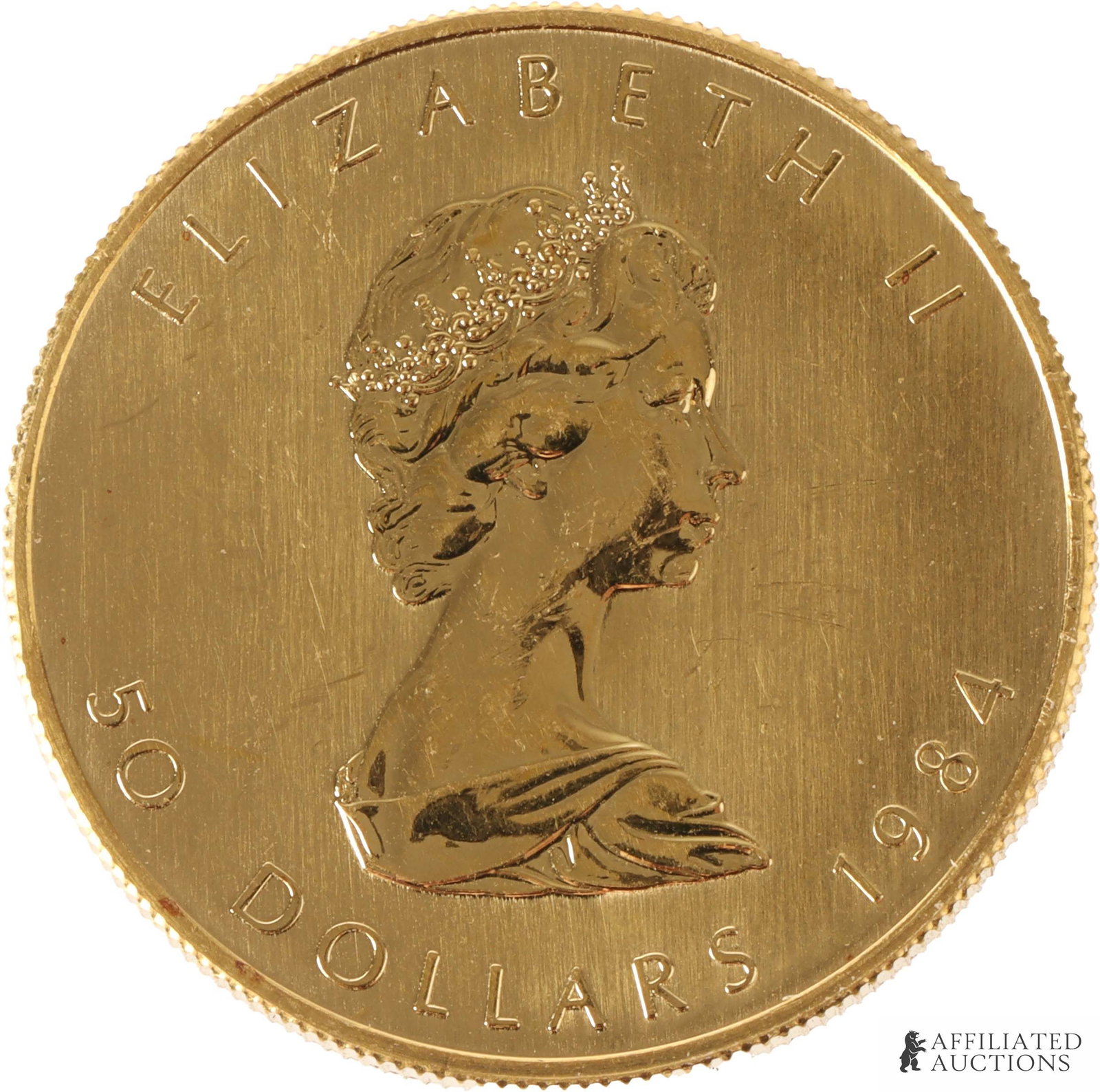 1 OZT Pure .999 Gold Maple Coin 1984: A 1984 Canadian $50 coin, featuring a bust of Queen Elizabeth II and the image of a maple leaf. Contains 1 ounce troy of gold. Metal: .999 gold Country of Origin: Canada Year Minted: 1984 | This lot h
