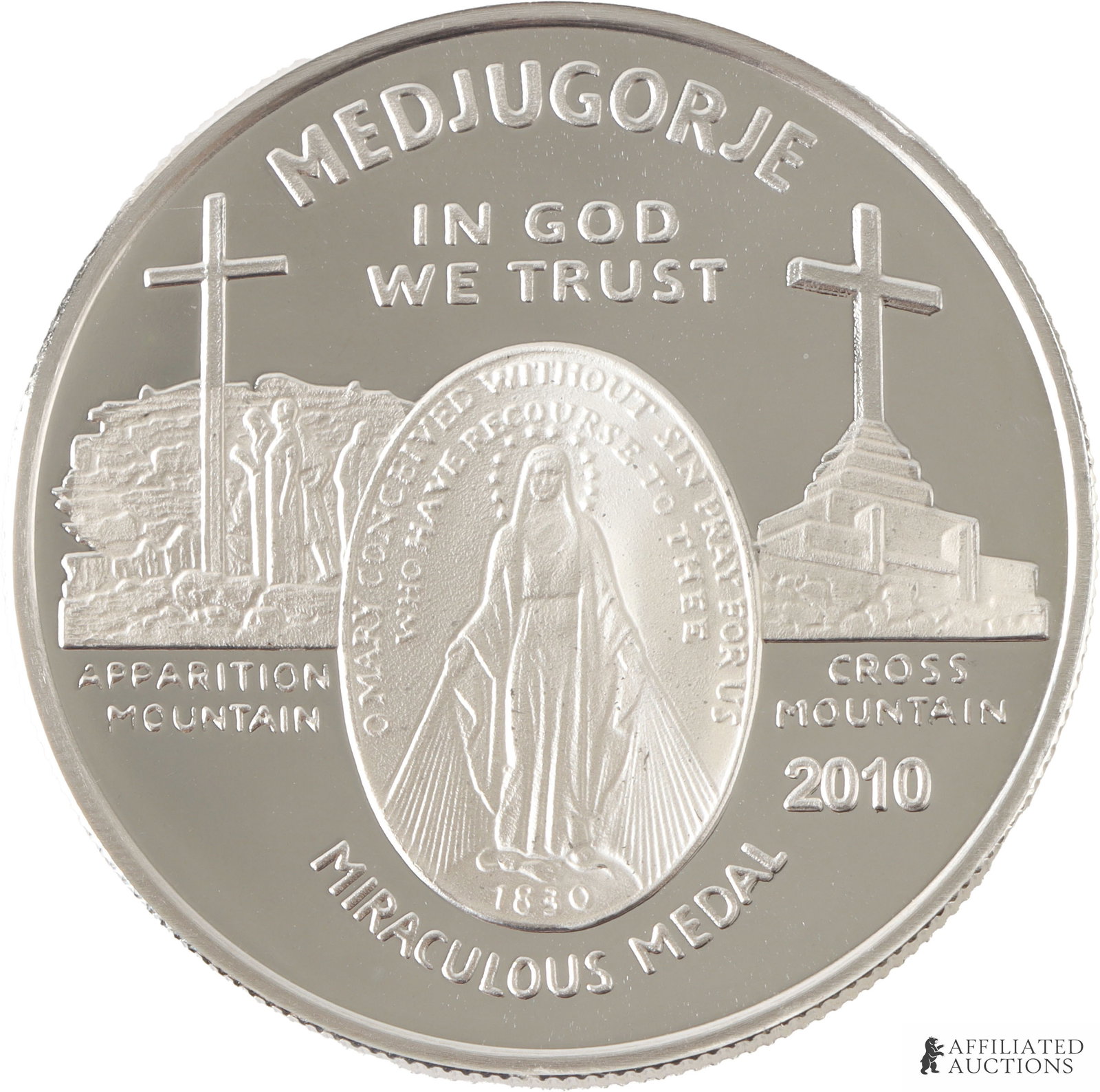 .999 Silver 1 OZT Medjugorje Miraculous Medal: A Medjugorje 'Miraculous Medal' made from one troy ounce .999 fine silver. This medal, produced by the Caritas of Birmingham, has the imagery of a secondary apparition site claimed to have been in the