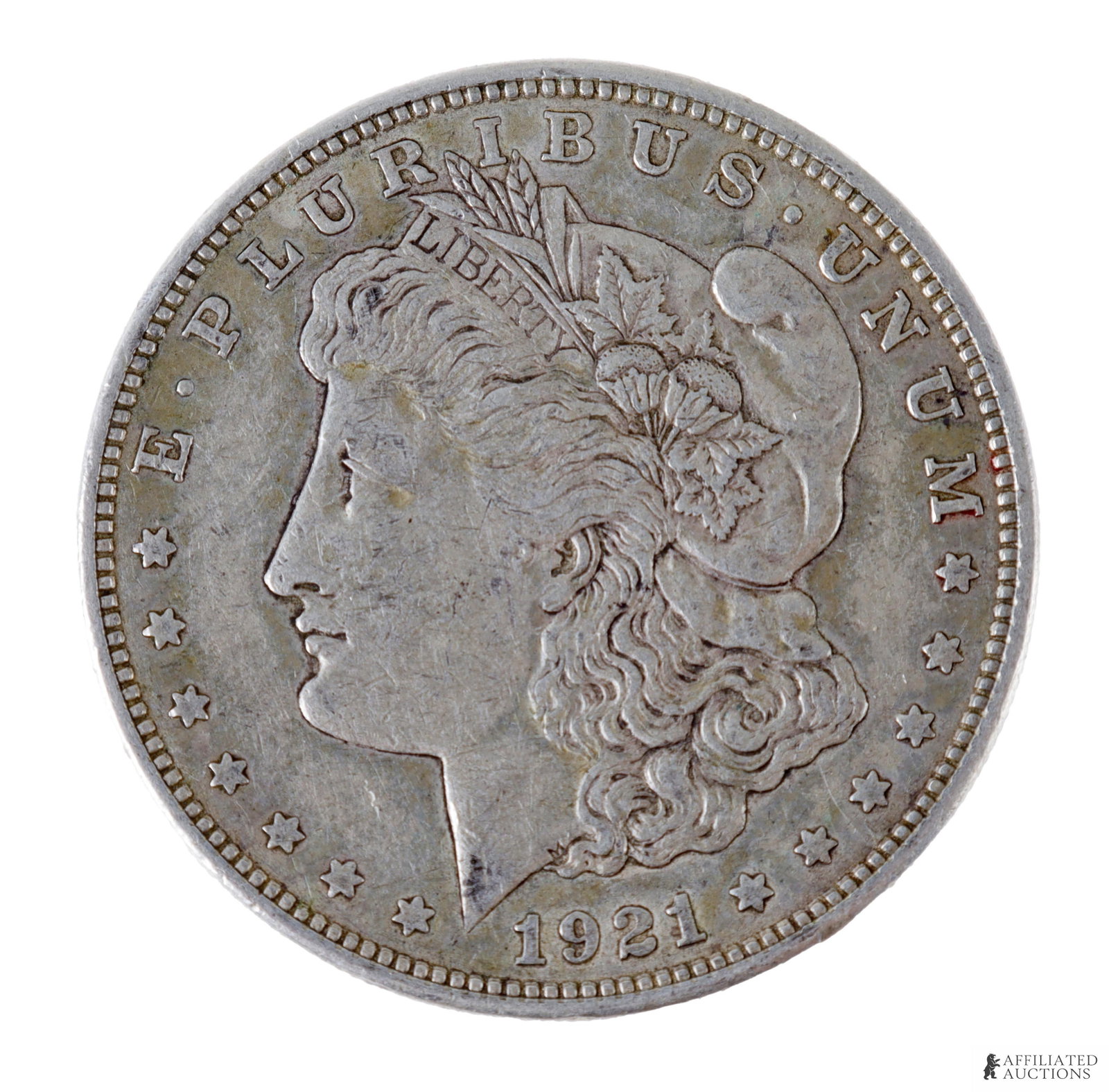 1921 Morgan Silver Dollar US Coin: 1921 Morgan Silver Dollar US Coin. 90% purity. Guaranteed. Metal: Silver Country of Origin: USA | This lot has a reserve.