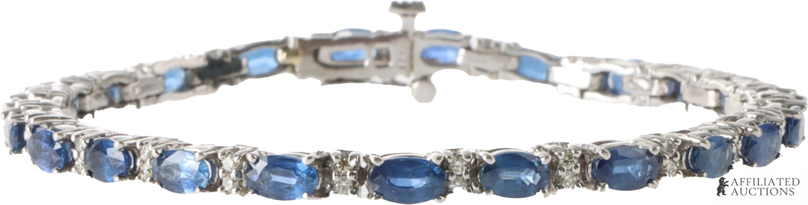 Sapphire Diamond Tennis Bracelet 14K White Gold: Stamped "14K" on clasp. Bracelet measures 7 inches. Sapphires measure 5x3 millimeters. Diamonds are single point. | This lot has a reserve.