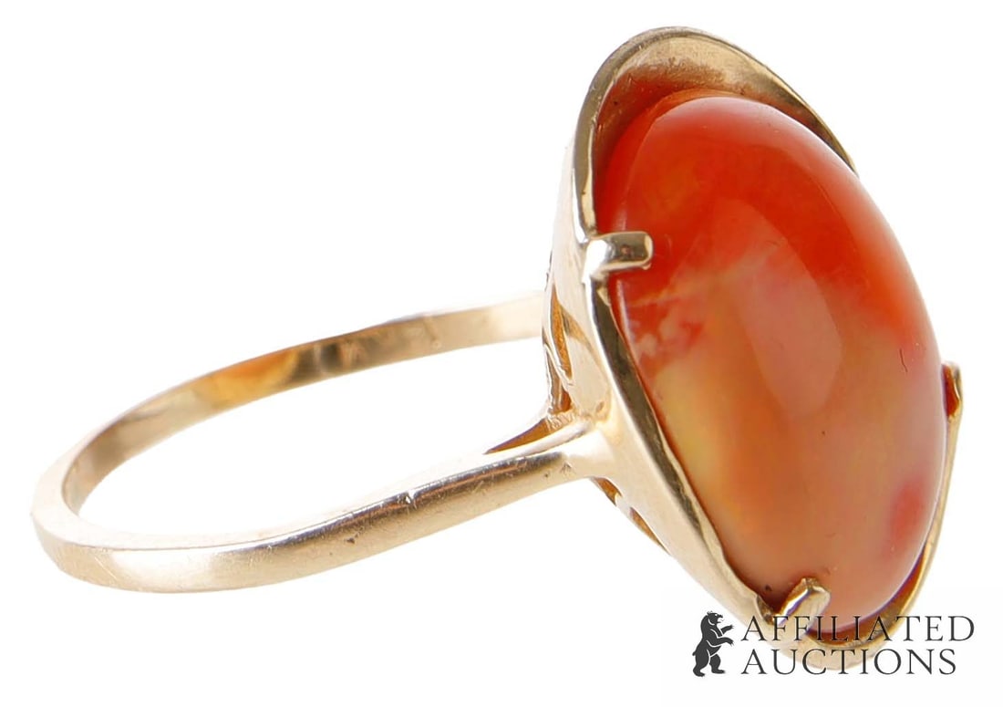 Carnelian Banded Agate & 14K Gold Statement Ring: An antique 14K cocktail ring with a vibrant central cabochon stone, possibly carnelian banded agate. Agate is 3.9 carats. Size 8. Weighs 4.9 grams. | This lot has a reserve.