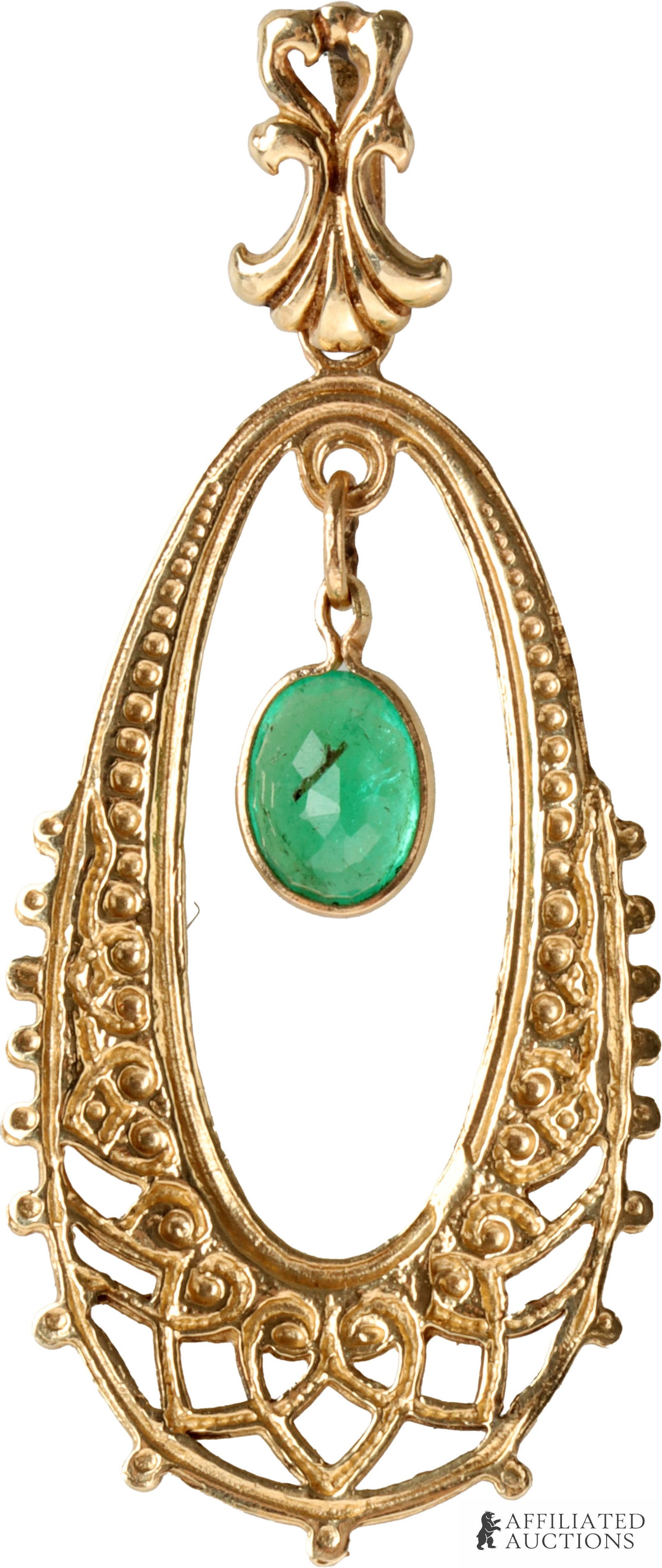 Filigree Openwork Pendant 14K Gold Antique: An oval filigree openwork pendant crafted in 14K gold, accented by a central bezel-set oval emerald. Based on design and appearance, this is an antique piece that may have been modified from an earrin