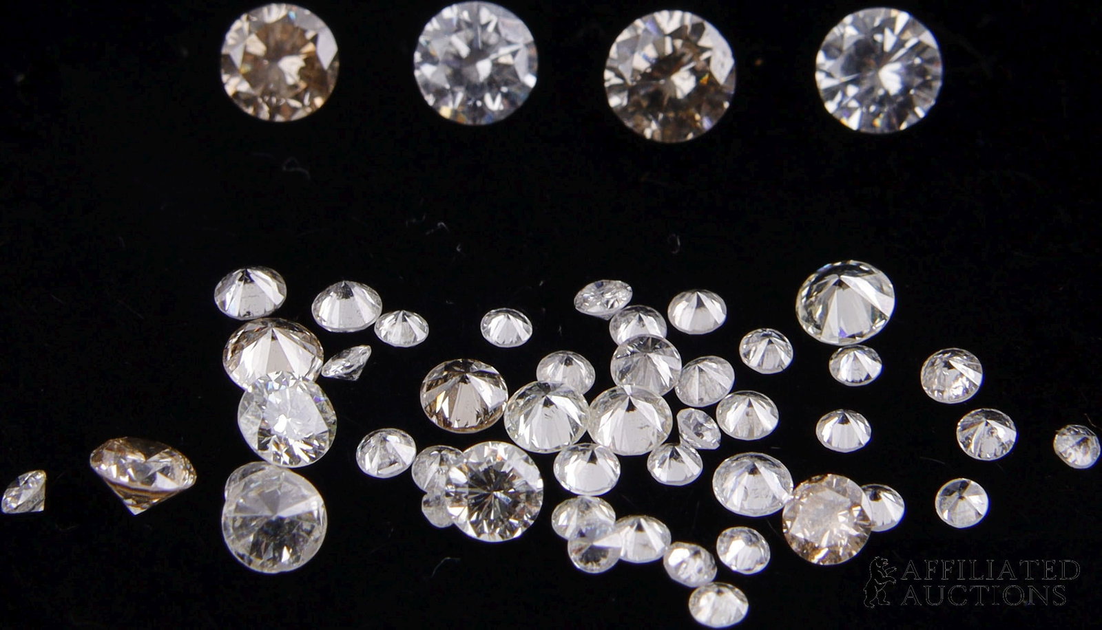 Reclaimed Diamonds 2.09 TCW with Matching Pair: Reclaimed Diamond lot with matching pair 2.09 TCW. Stones are all round cut with size ranging from 0.18 ct to melee. Color ranges from near colorless to champagne. Matching pair are colorless to near 