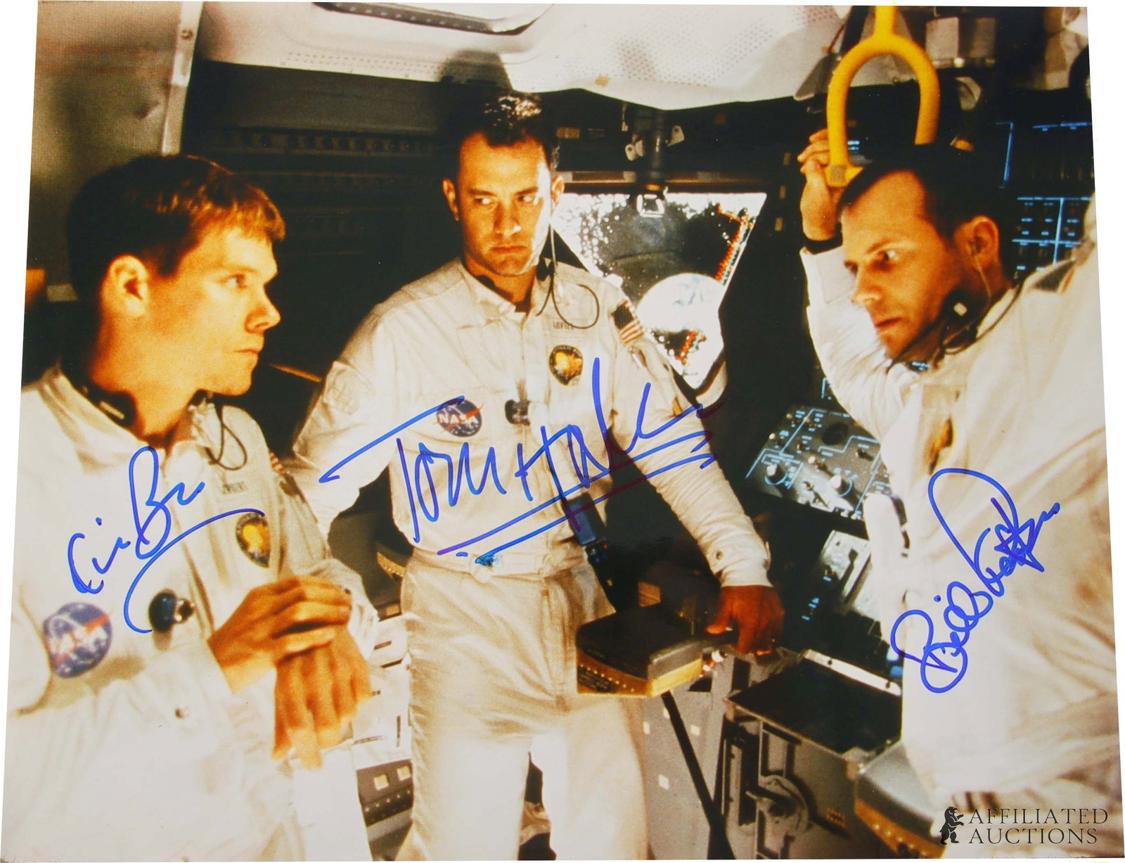 Tom Hanks Kevin Bacon Bill Paxton Apollo 13 Auto: A multi-signed photograph from the acclaimed 1995 space drama Apollo 13, hand-signed by all three primary lead actors depicting the crew: Tom Hanks, Kevin Bacon, and the late Bill Paxton. Signatures a