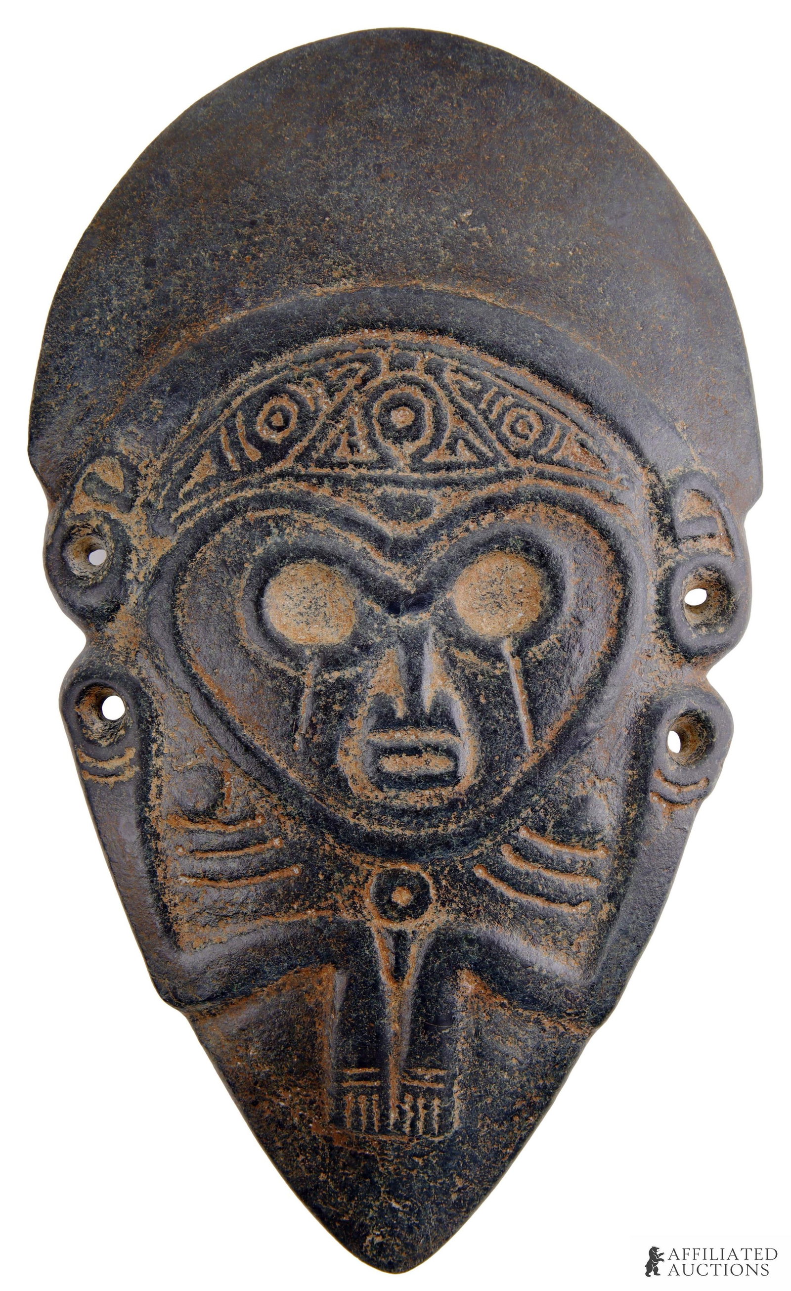 Published Taino Ax Form Boinayel: A classic Taino ax-form representing the male god Boinayel, one of several Taino rain-god deities. He is rarely represented in Taino art. The distinctive lines running from the eyes supposedly represe