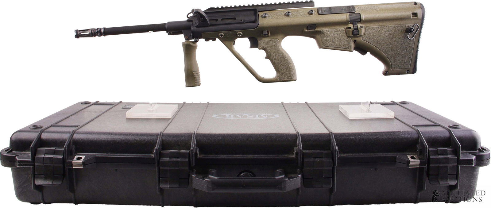 MSAR XM17-E4 .223 Rem Bullpup Semi-Auto Rifle: Microtech Small Arms Research XM17-E4 semi-automatic bullpup rifle on the pattern of the Steyr AUG. Accepts standard AR-15 magazines. Includes optic mount kit, Pelican 1700 factory rolling hard case a