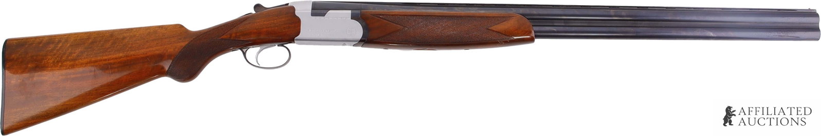 Beretta S.55 12 Gauge Over-Under Shotgun: Beretta Model S.55 over-under shotgun, 12 gauge, mod. choke over and imp. cyl. under. Barrel length 28 inches. LOP 14 inches. Full length vent rib with brass bead front sight. Checkered wood stock. En