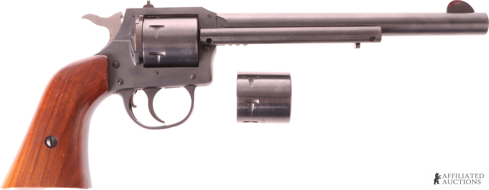 H&R Model 649 .22 Double-Action Revolver: Harrington & Richardson Model 649 double-action revolver. Barrel length 7.5 inches. Capacity 6 rounds. Blued steel with wood grips. Includes two (2) interchangeable cylinders for use with .22 LR & .22