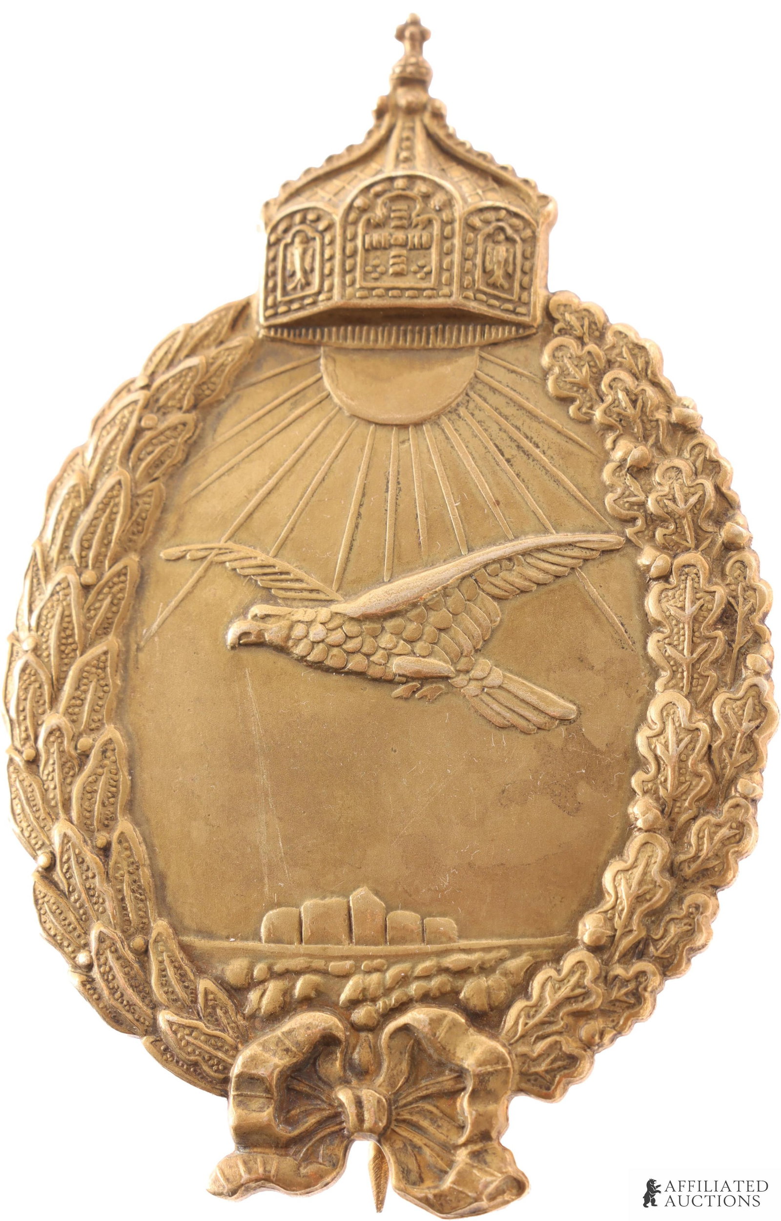 WWI Imperial German Naval Pilot Badge: WWI Imperial German Navy Pilot badge. Stamped construction in brass. Vertical pin with C catch. It measures 69.78mm. | This lot has a reserve.