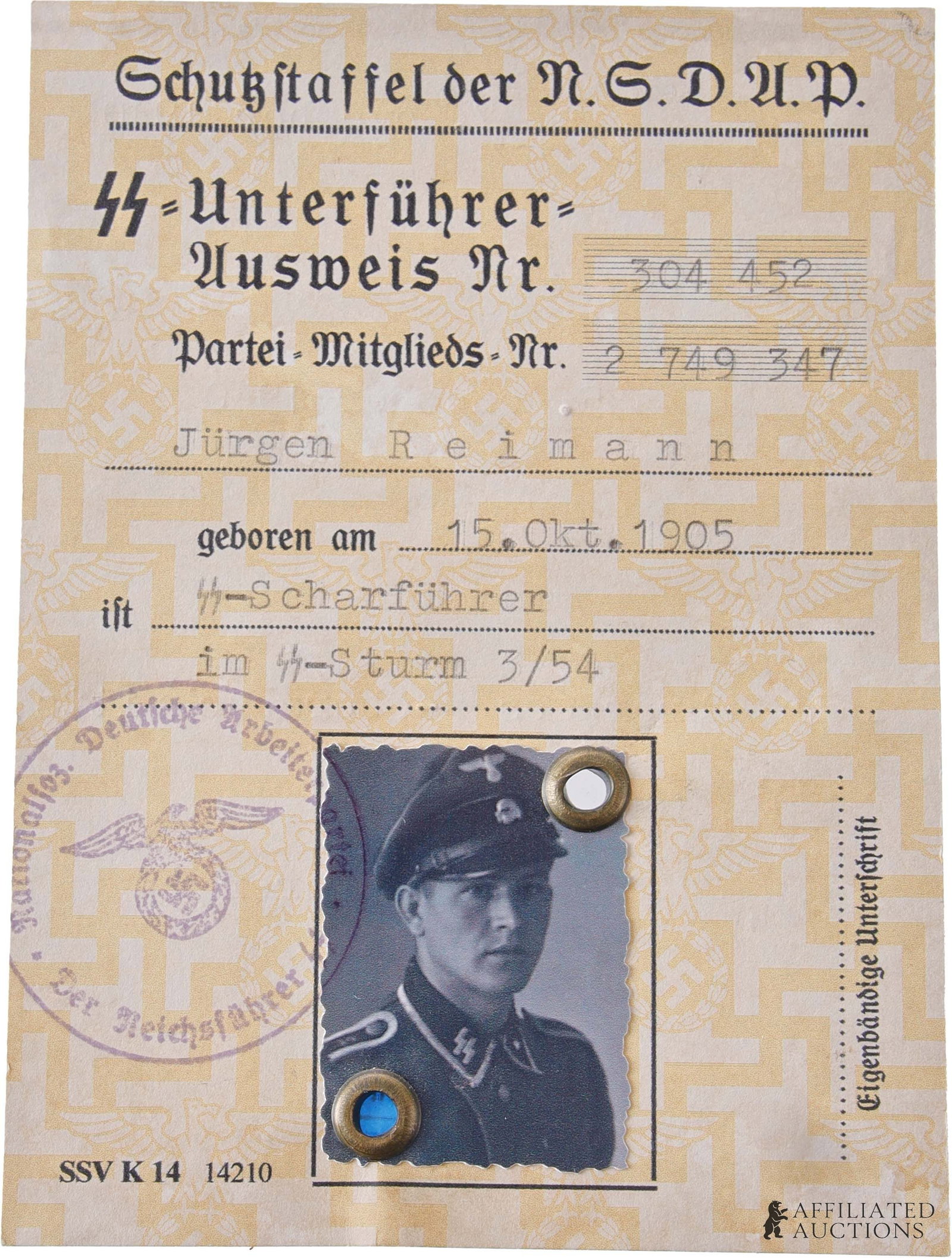 1941 SS Squad Leader ID Card Unterfuhrer-Ausweis: Identification card of SS-Scharfuhrer Jurgen Reimann. Card stock with swastika background motif. Ausweis no. 304452, Party Membership no. 2749347, birth date October 15, 1905, 3rd company of the 54th 
