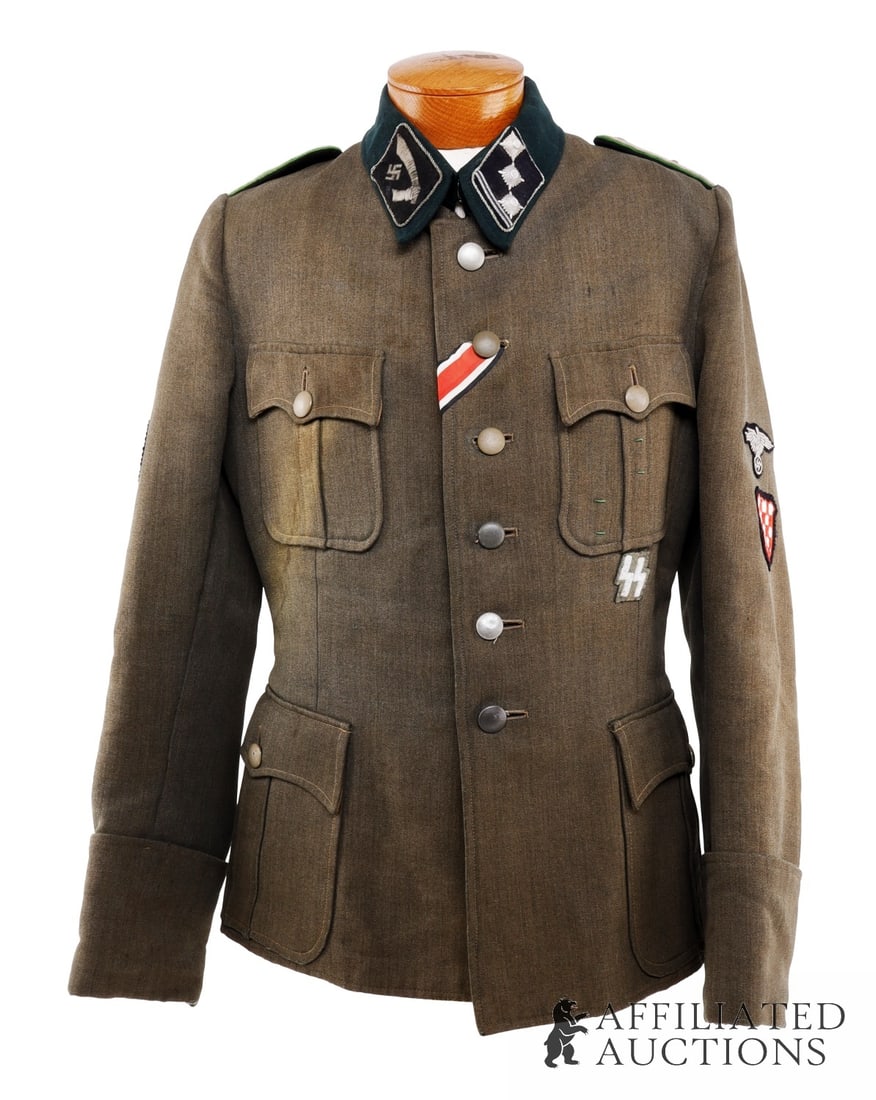 Waffen SS Handschar 13th Mountain Division Tunic: 13th Mountain Division tunic. Expertly tailored from Italian gabardine. This particular fabric was a common luxury for officer-grade uniforms. The tunic features the division?s distinctive scimitar-an