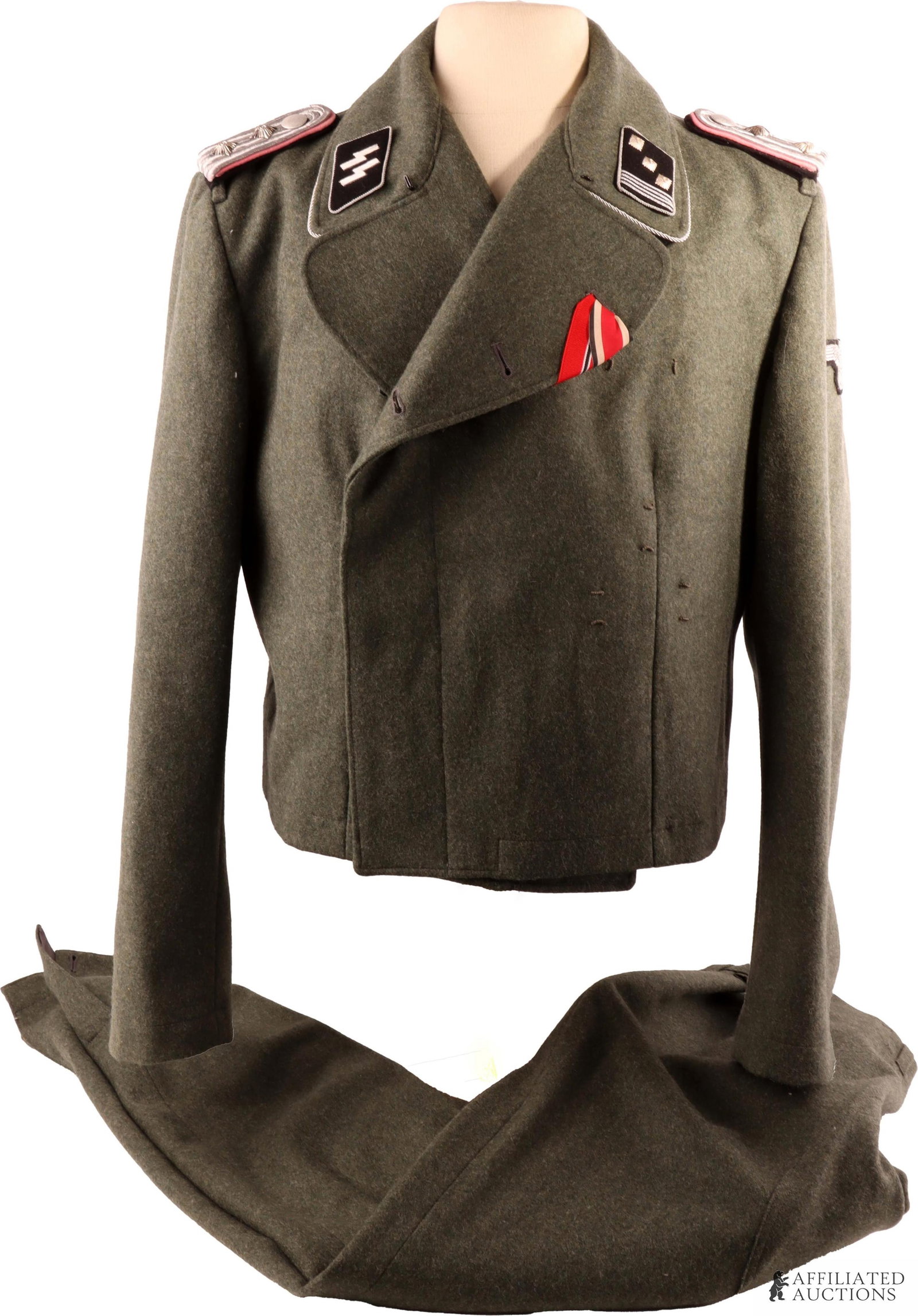 Waffen SS panzer Wrap & Trousers WWII German: Field grey panzer wrap with trousers. The wrap features bullion wire shoulder boards with 2 pips, bullion collar tabs with 3 pips and 4 bars, bullion reichsadler on left arm, Bakelite buttons, and rib