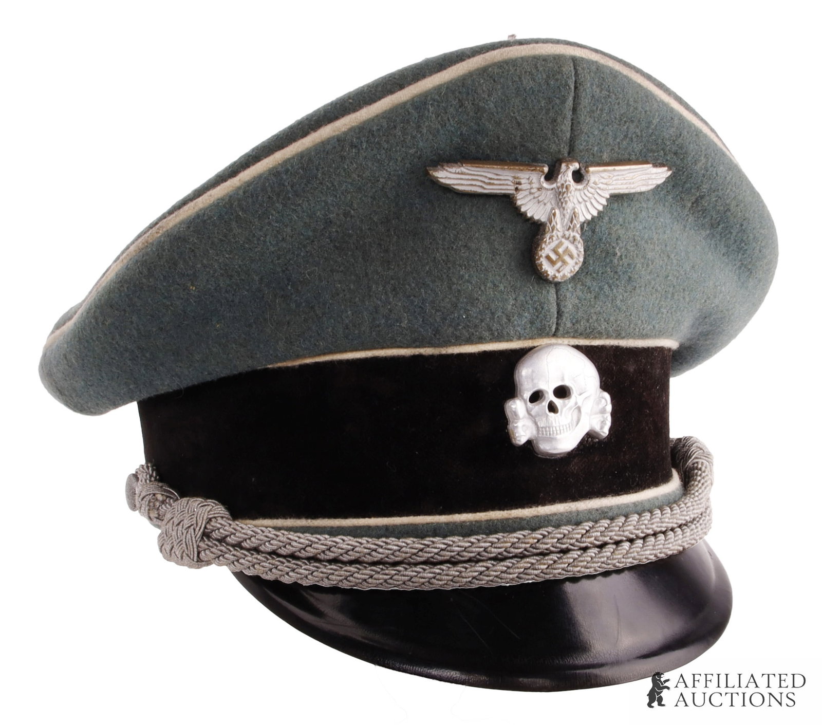 Waffen-SS General Officer Visor Cap WWII German: Waffen-SS general officer's visor cap of field gray wool with white piping, black doeskin band, vulcanized fiber visor and aluminum bullion wire chin cord. Interior has leather sweatband and rayon lin