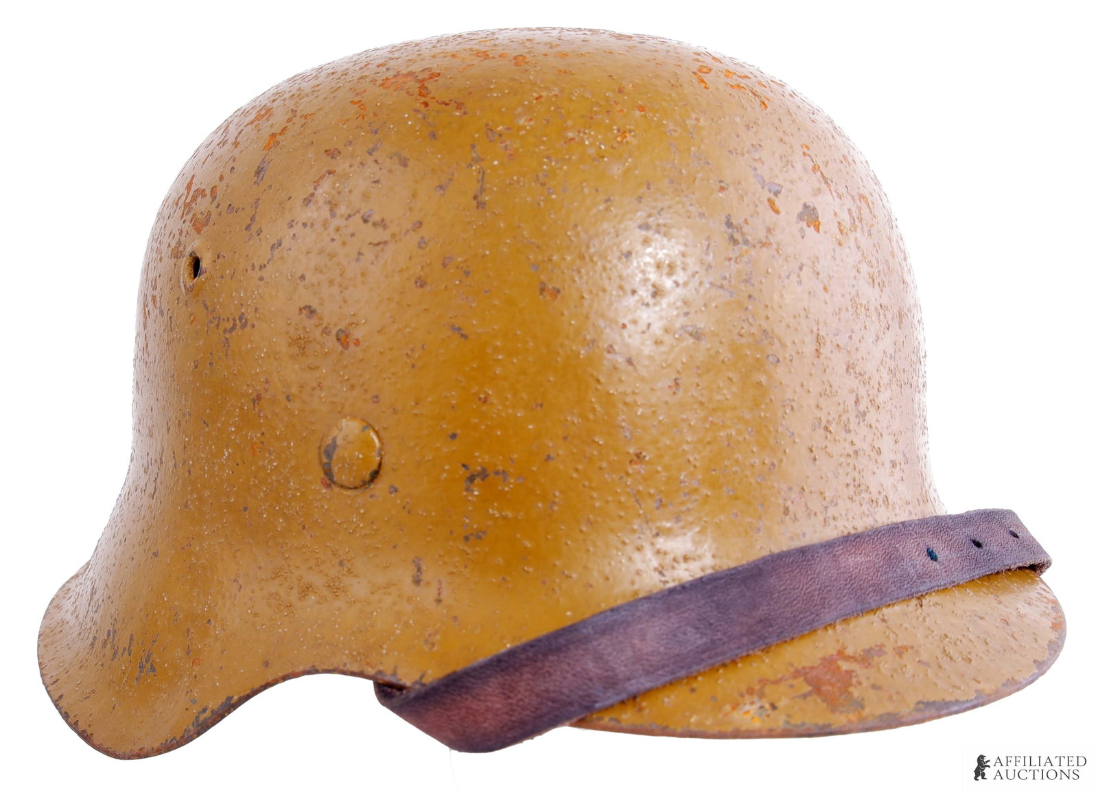 Named M42 DAK Camo Helmet WWII German: Named Third Reich M42 Desert Afrika Korps Helmet. Standard beige camo over factory grey paint. Some of the original paint shows through the field camo. Interior features leather liner with two named. 