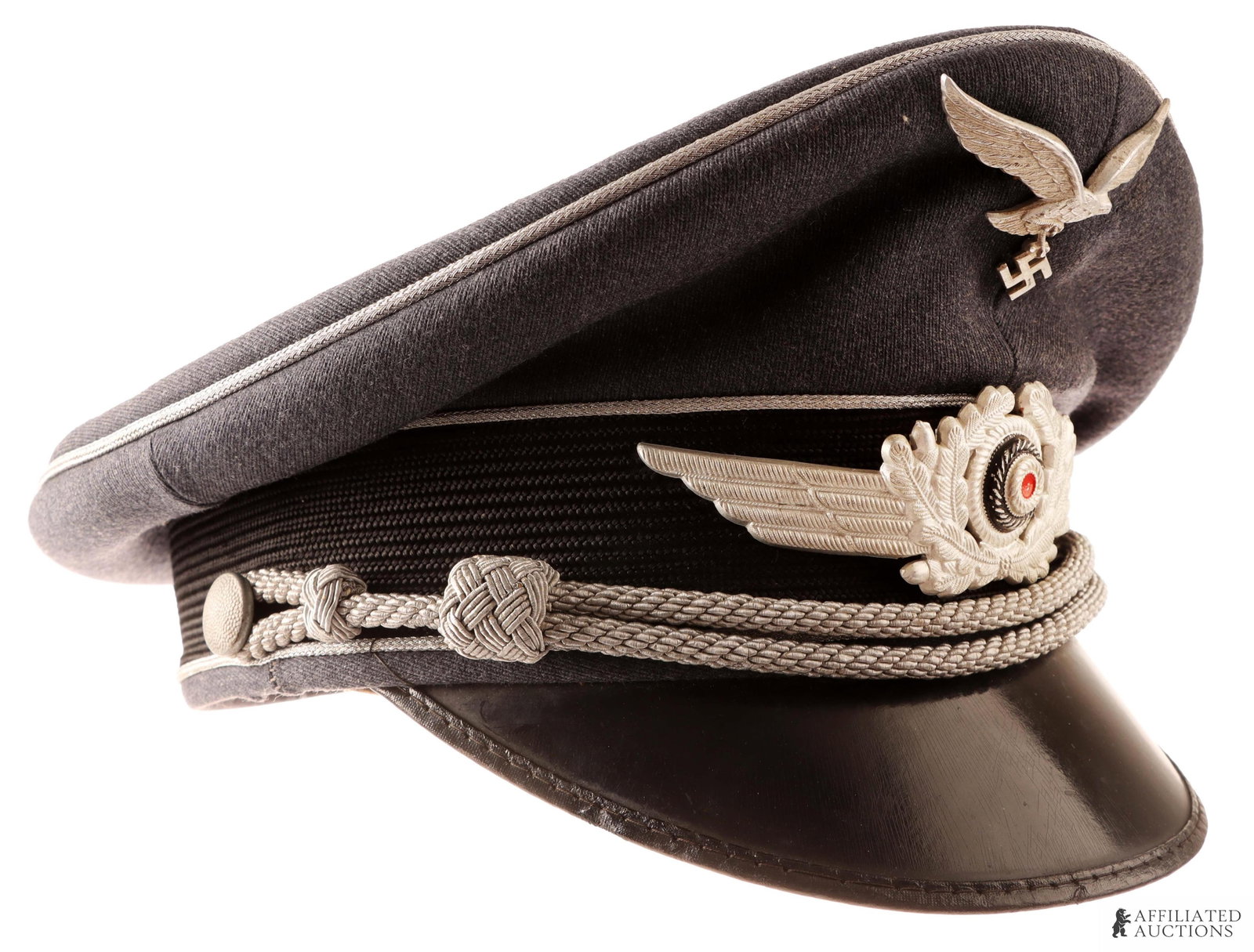 Luftwaffe NCO Visor Cap WWII German Reich: Blue gabardine construction. Features aluminum bullion piping with bullion chin strap. Interior has a leather sweatband with cloth lining. Interior diameter measures approximately 7 7/8 inches, likely
