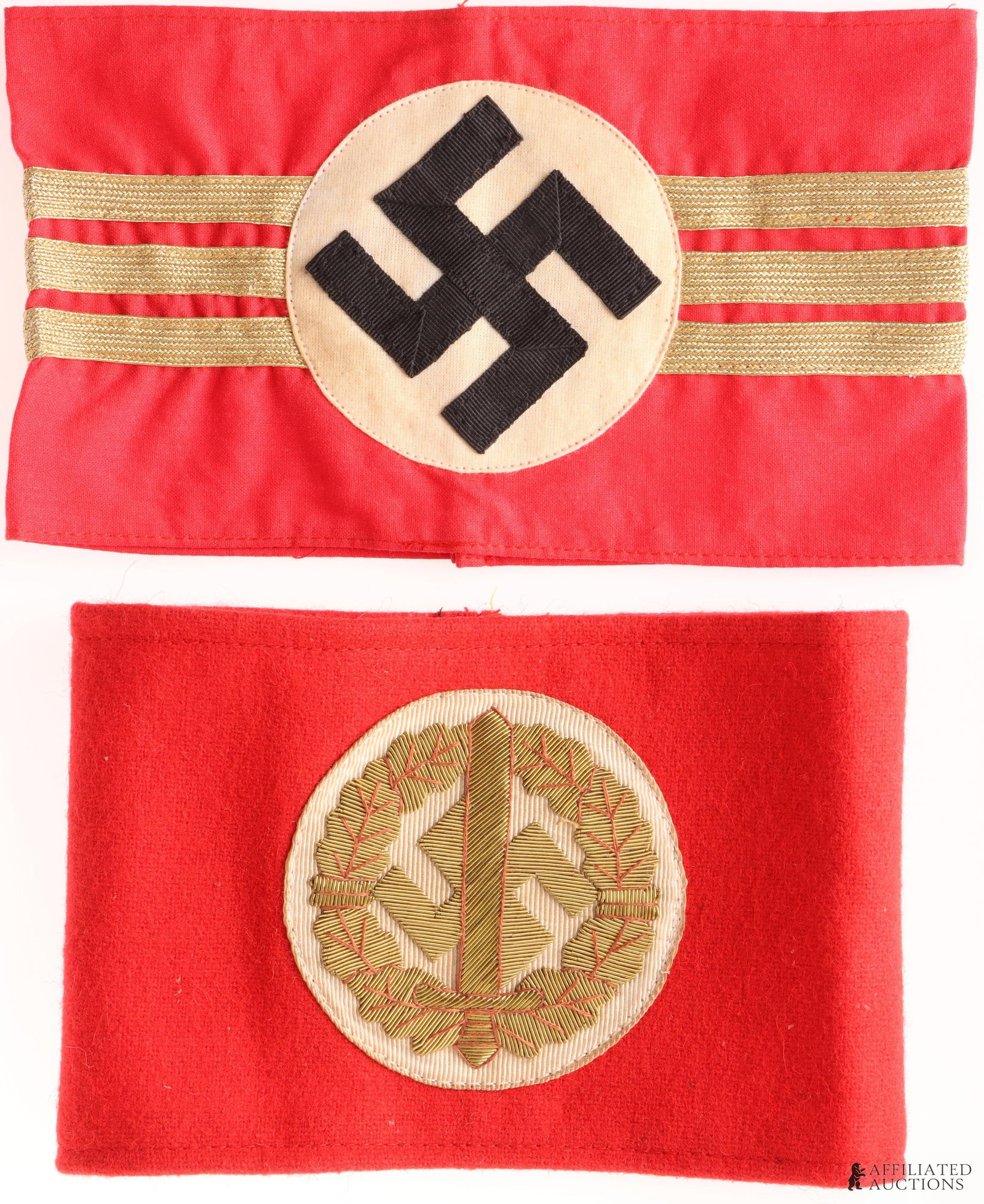 2 SA or Political Armbands WWII German Reich: One standard armband with separate roundel. Three gold bullion stripes likely for rank. It measures 8 3/8 X 5 inches. The other is a gold bullion embroidered swastika with oak leaves and a sword. It i