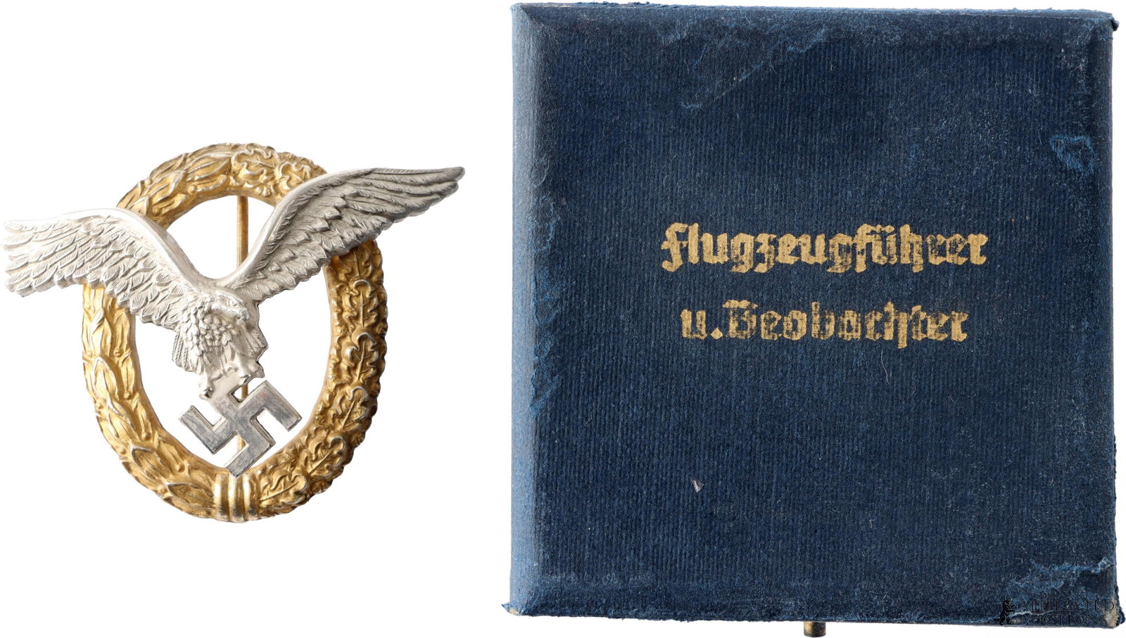 Cased Luftwaffe Pilot Observer Badge WWII German: WWII German Third Reich Luftwaffe pilot badge. Zinc construction with gilt brass and silver. Early heavy type. Maker marked IMME. It measures 52 X 63mm. | This lot has a reserve.