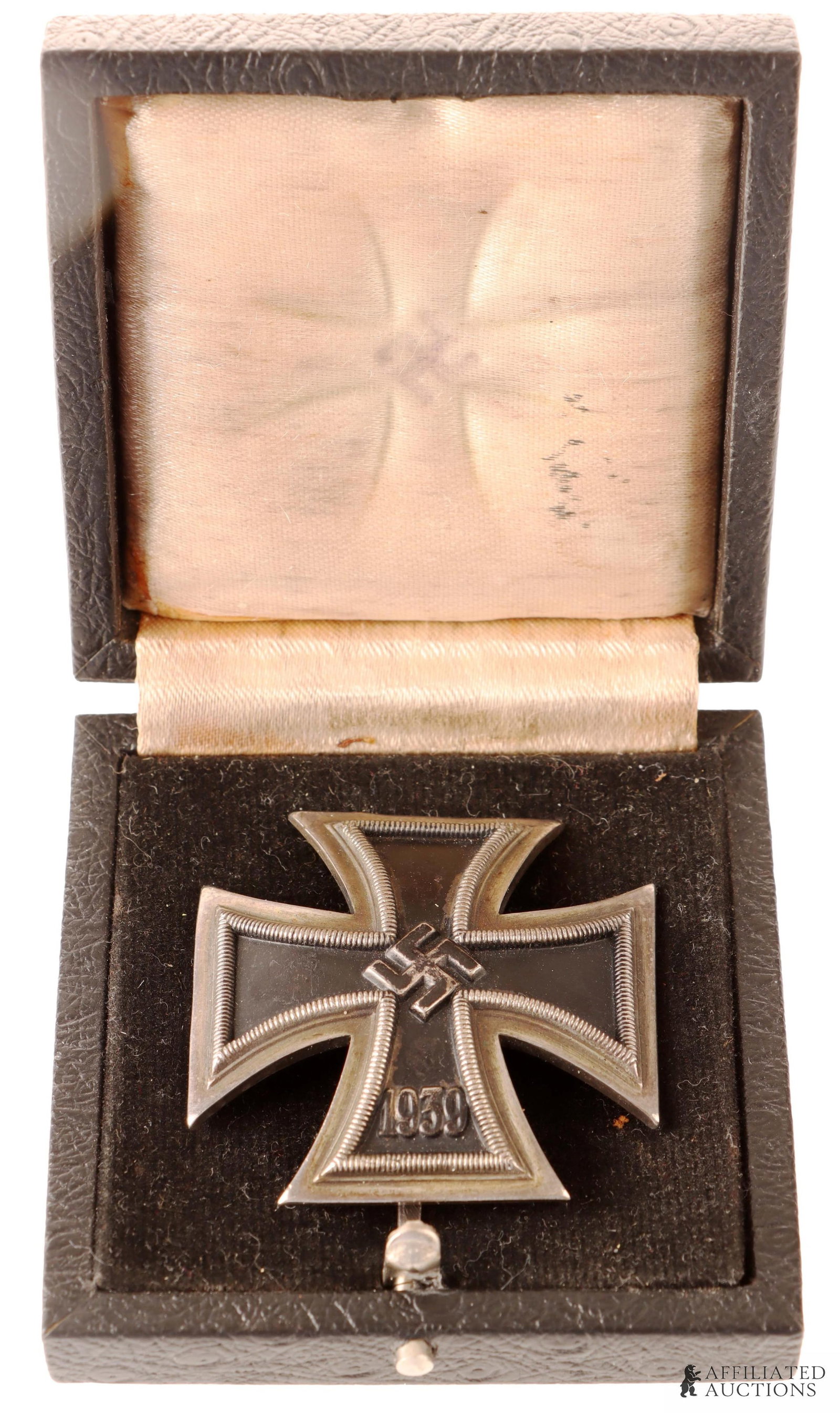 Cased 1939 Iron Cross First Class WWII German: Cased WWII German Iron Cross First Class. Cupped type. One piece struck in 925 sterling silver. No separate frame or magnetic core. Lacquered finish. It measures 43mm. Marked 925 on cross and 51 on
