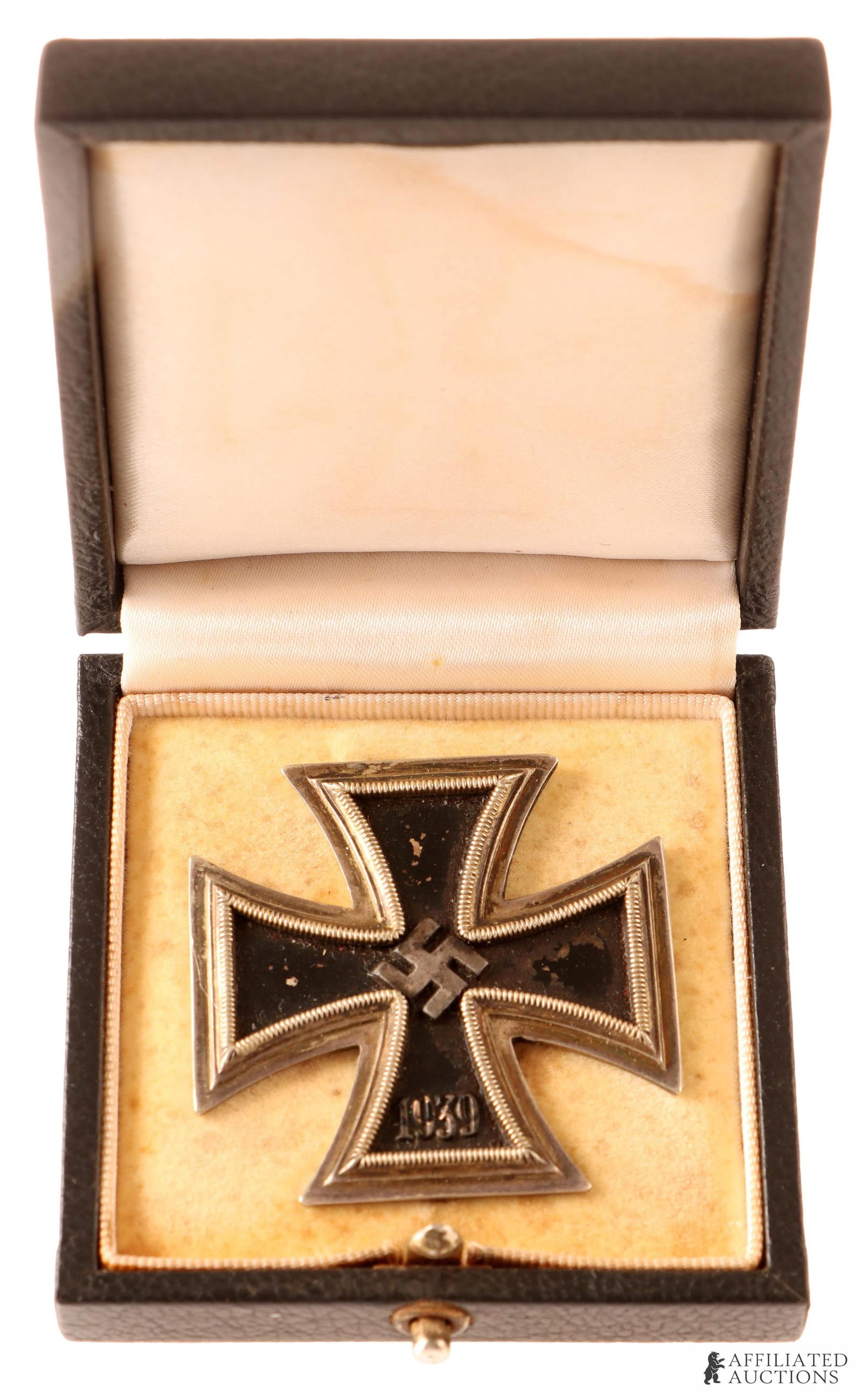 Cased 1939 Iron Cross First Class WWII German: Cased WWII German Iron Cross First Class. Solid magnetic core with frame. Lacquered finish. It measures 44mm. No maker's marks. Previously from the collection of Darryl Hartsman. | This lot has a