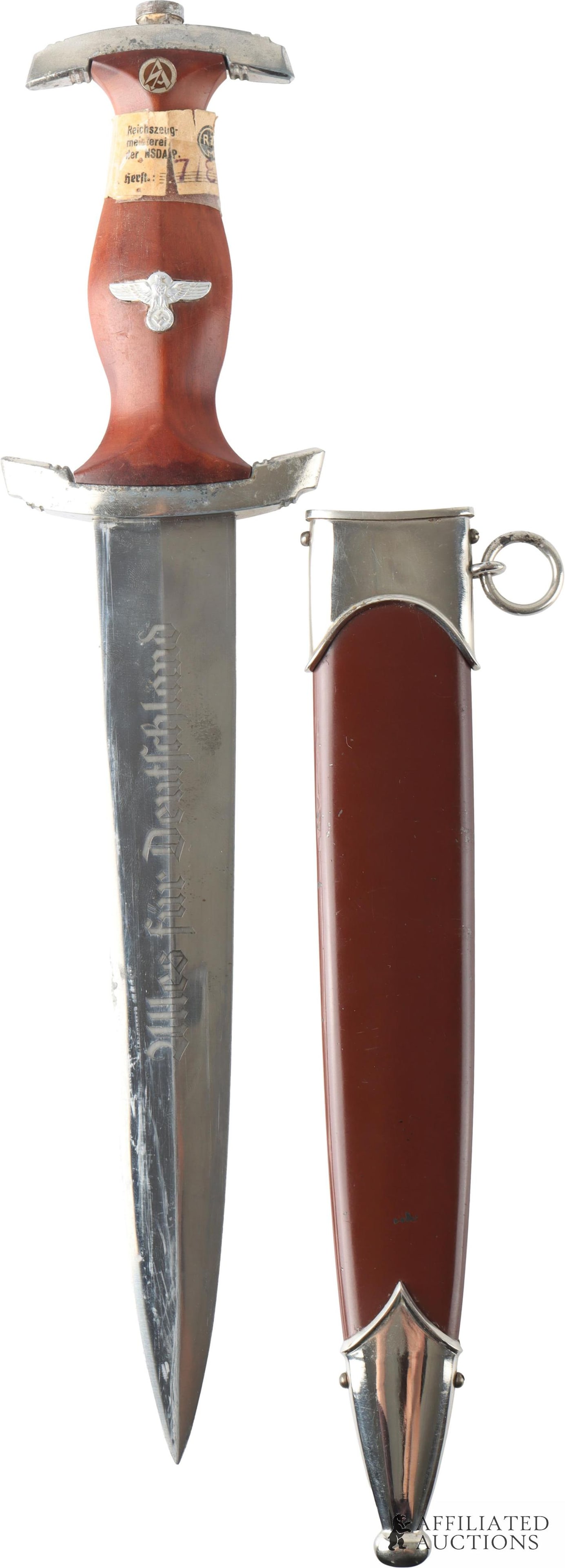 SA Dagger RZM M7/80 WWII German: WWII German SA dagger with original label on handle. Near mint blade with acid etched motto and RZM M7/80. Wood grip with inlaid SA runes and aluminum eagle. Overall length 13 5/8 inches. Tight fit in