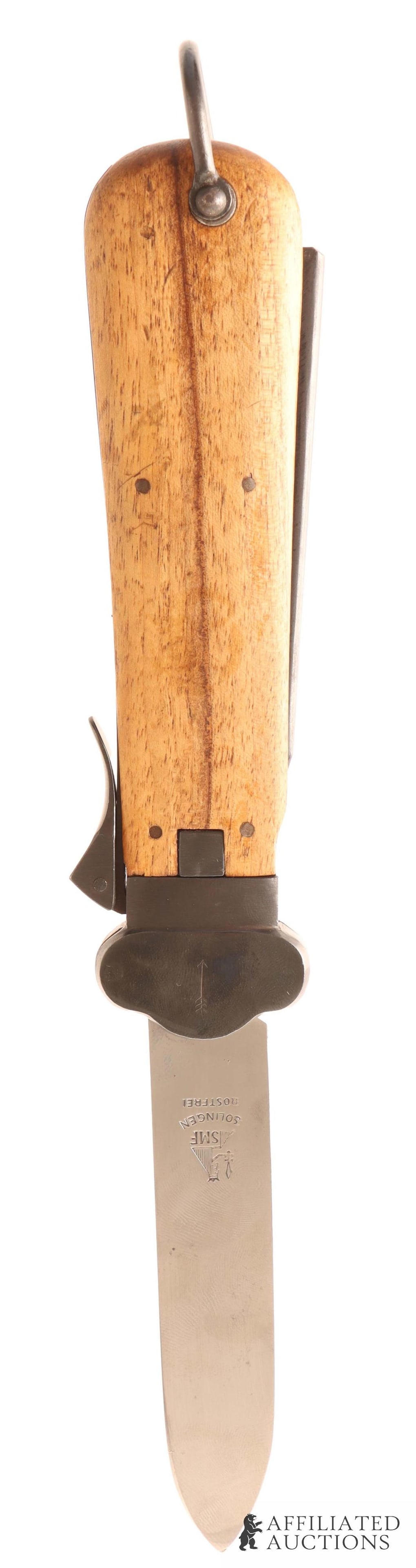 German Fallschirmjager Paratrooper Gravity Knife: Fallschirmjager gravity knife. SMF make. Numbered "668" on thumb catch, blade, and locking mechanism. The marlinspike has an eagle with a '5' inside. Hardwood grip plates with 4 pins on each side. D R