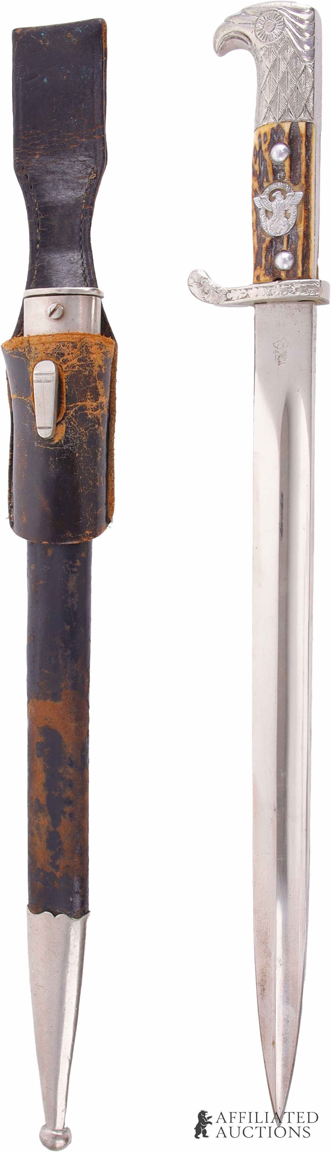 Police Dress Bayonet W Frog WWII German Reich: WWII German municipal police bayonet with frog and scabbard. Nickel plated steel blade with | WKC maker's mark on obverse and Weyersberg Kirschbaum & C Solingen mark on reverse. Blade spine is