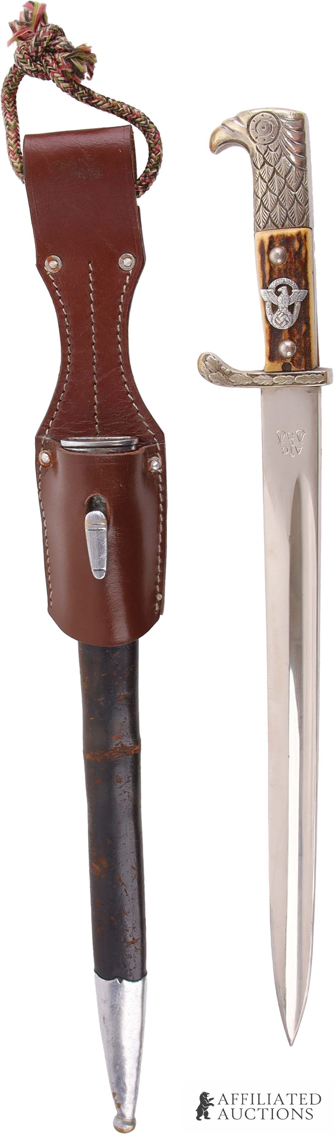 Police Dress Bayonet w/ Frog WWII German Reich: WWII German municipal police bayonet with frog and scabbard. Nickel plated steel blade with | ACS maker's mark on obverse and Alexander Coppel mark on reverse. Blade spine is stamped. Stag grip
