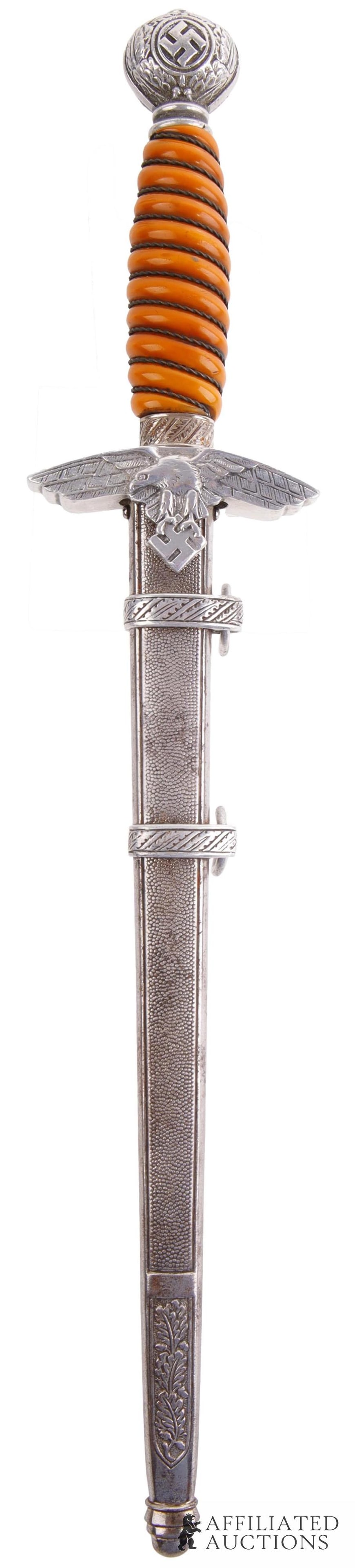 Luftwaffe 2nd Model Officer's Dagger E.F. Horster: WWII German Luftwaffe Officer's Dagger, Second Model, with scabbard. Nickel-plated steel blade. Wire-wrapped Bakelite grip with aluminum cross guard and pommel. Ricasso has faint maker's mark of E.F.