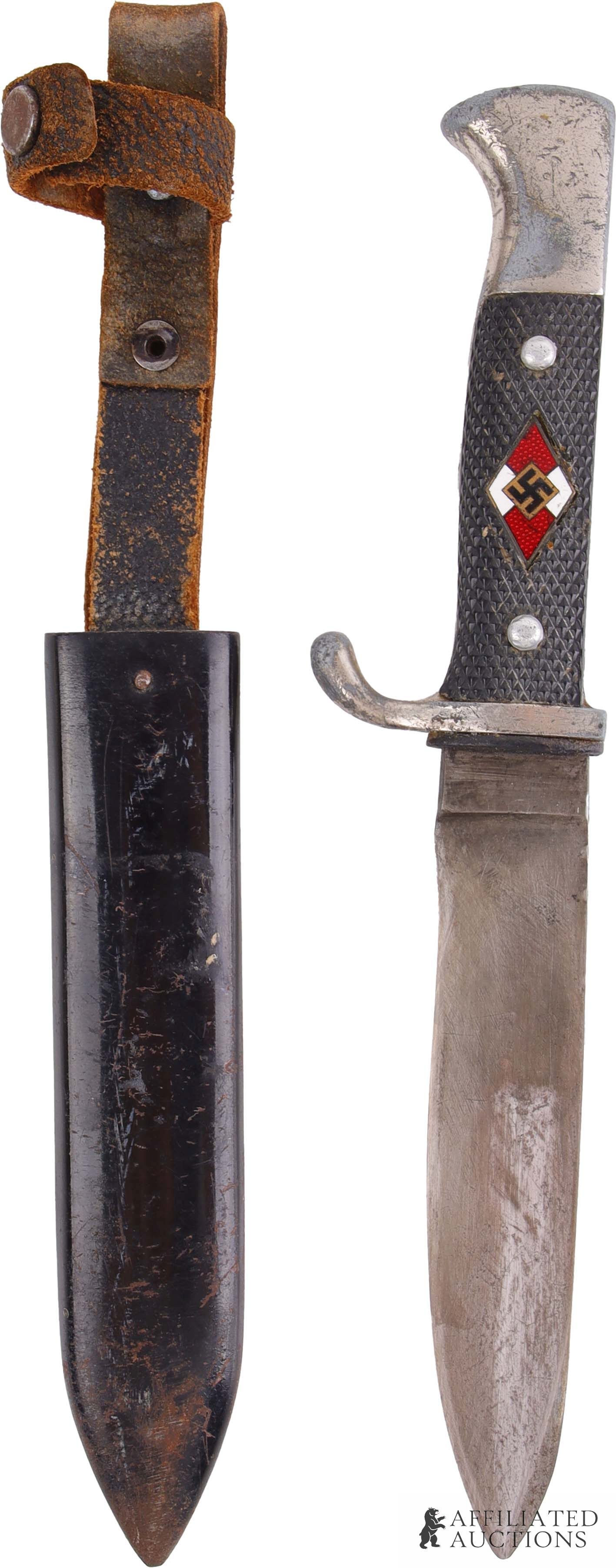 Hitler Youth Knife RZM M7/14 WWII German: Steel blade with zinc finger guard and pommel. Housed in steel scabbard. W Steinbach hand engraved into reverse of scabbard. Inlaid HJ diamond with riveted Bakelite checkered grips. It measures 9 1/8