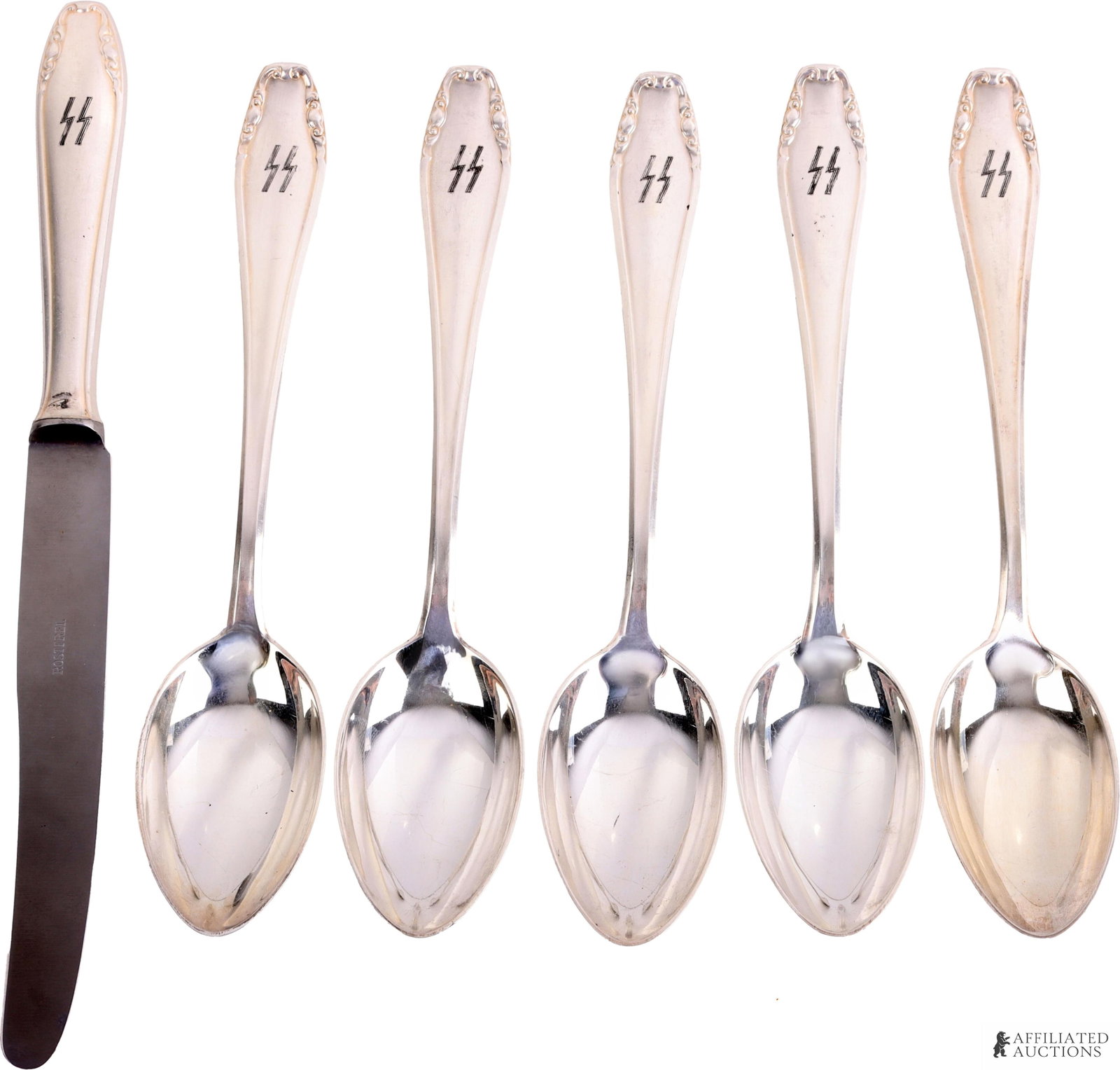 Lot of 6 SS Silver Plated Spoons WWII German: Large spoons with SS runes monogrammed. Reverse marked SS Reich and 90 for purity. They measure 8 1/2 inches. Includes butter knife. | This lot has a reserve.