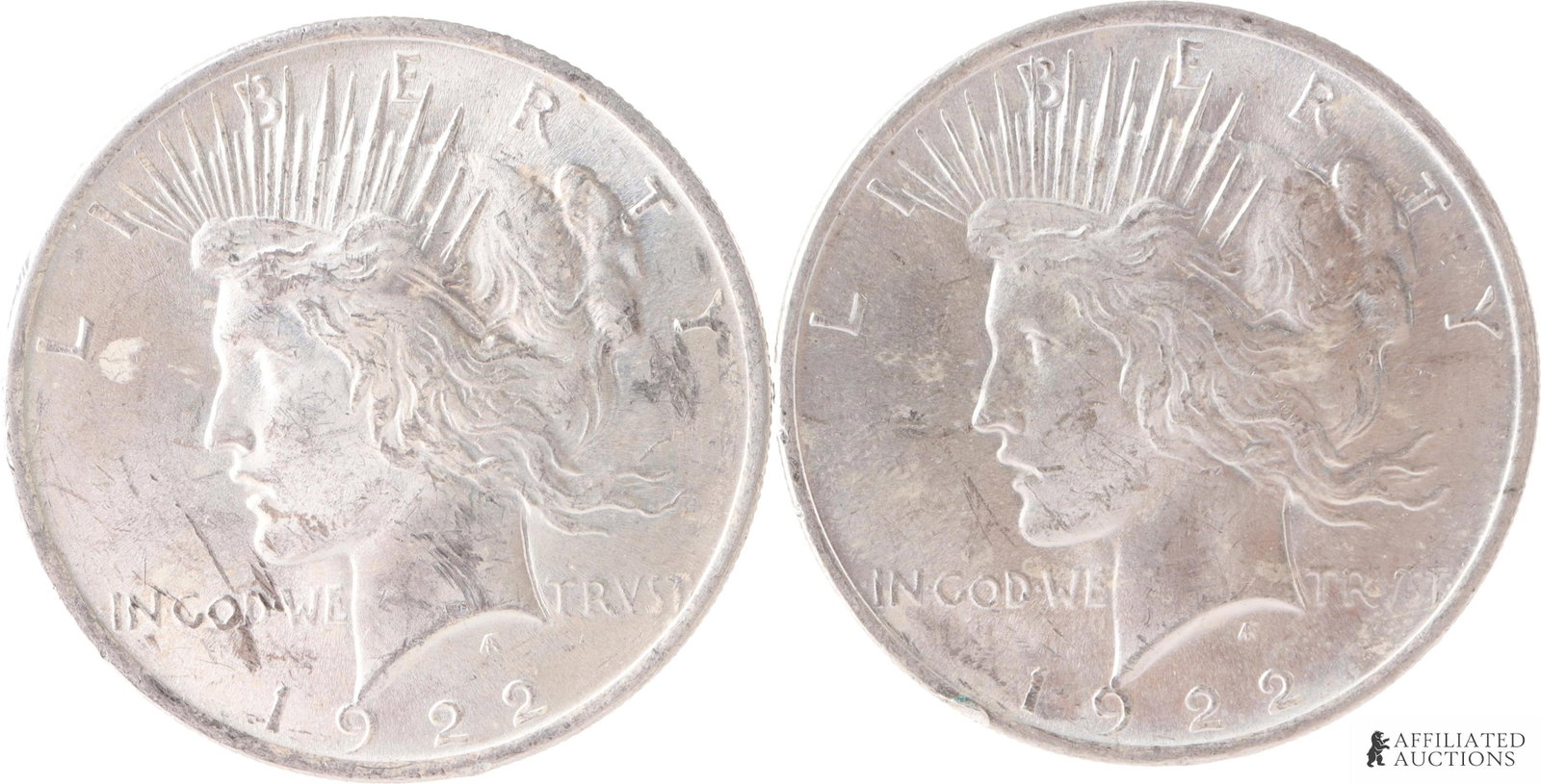 1922 United States Peace Silver Dollar Lot of 2: Two (2) 90% silver United States Peace silver dollars, both 1922, Philadelphia. Mint. Each coin contains .7734 of a troy ounce of silver, for a total of 1.54 troy ounces. Metal: 90% silver Country of 