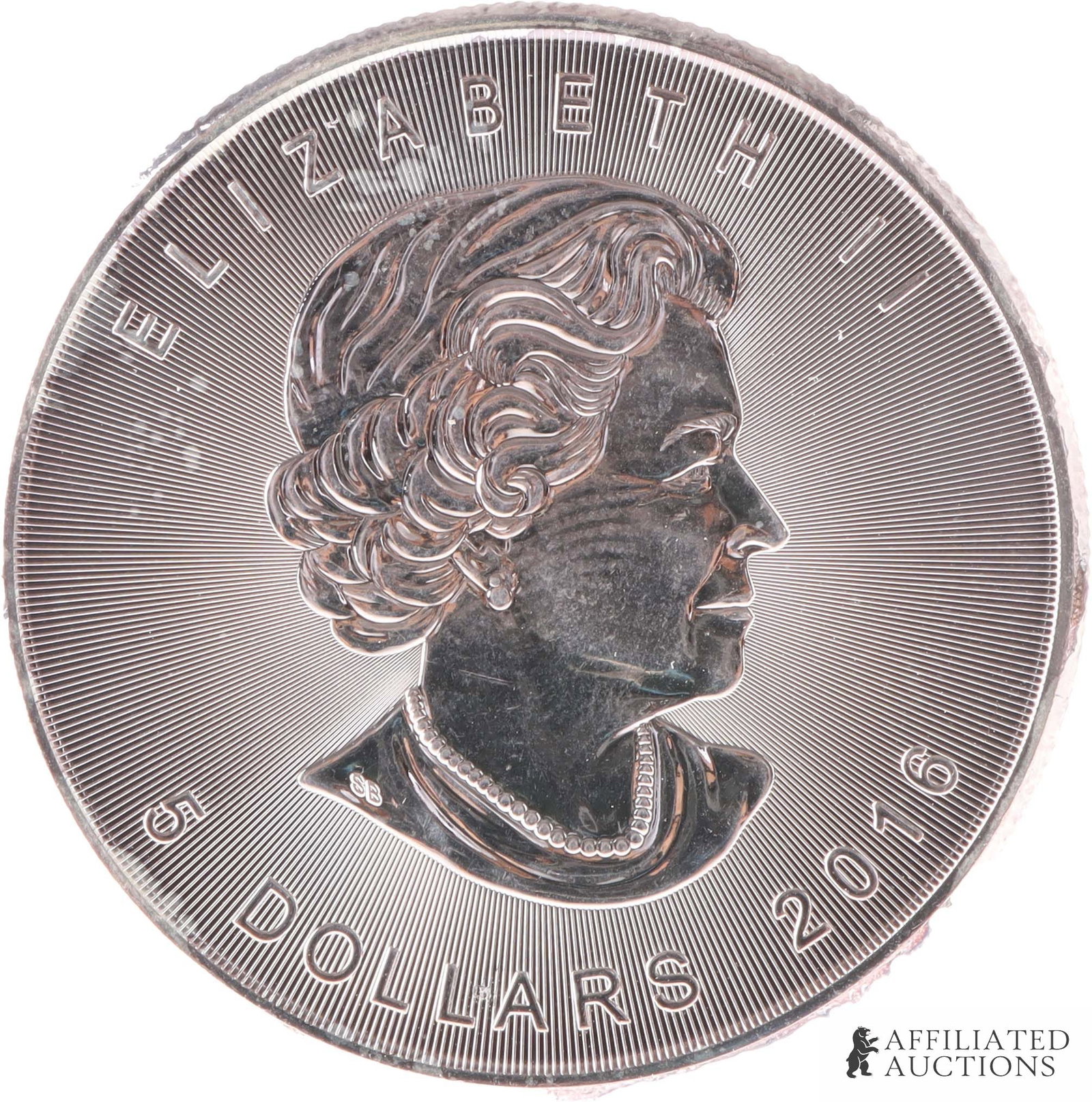 2016 Canadian .999 Silver Maple Coin: A .999 fine silver Canadian maple, bearing on the obverse Elizabeth II and on the reverse a maple leaf. Denomination $5. 2016. Metal: .999 fine silver. Country of Origin: Canada Year Minted: 2016. | T