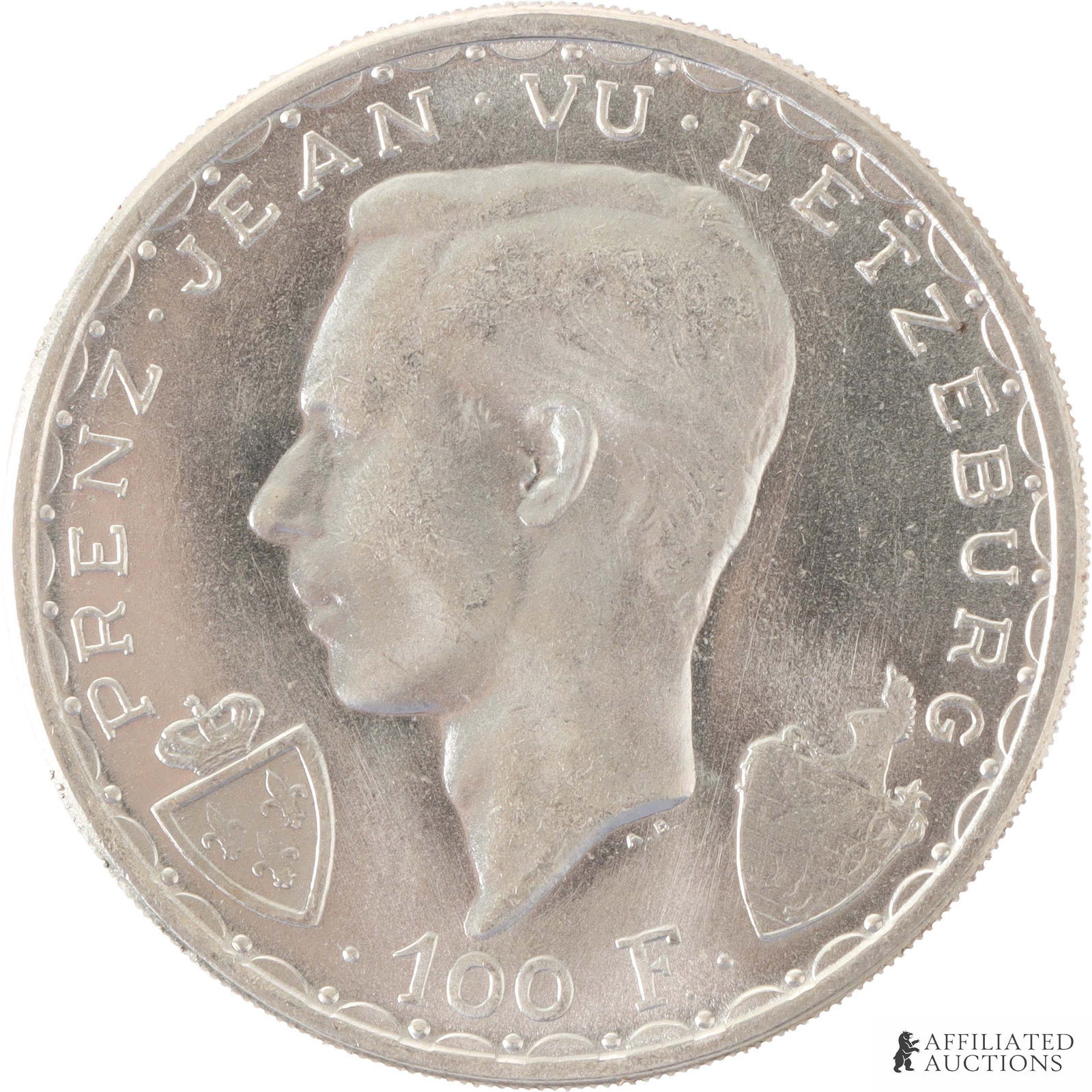 1946 Luxembourg 100 Francs Silver Mint Coin: 1946 Luxembourg Charlotte 100 Francs Silver coin. Weighs 25 Gram. Obverse shows Prince Jean Grand Duke, heir of Luxembourg. Reverse shows John the Blind on horseback. Metal: .835 Silver Country of Ori