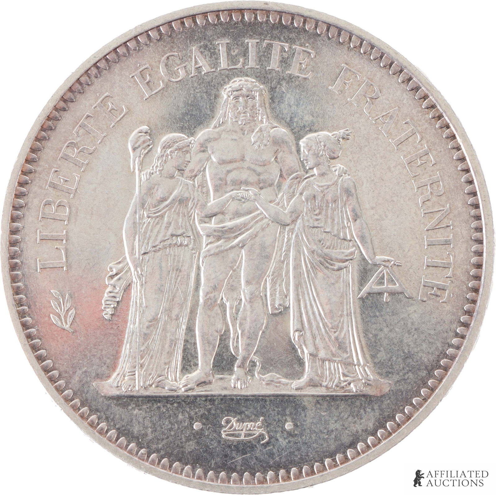 1974 French 50 Francs 90% Silver Coin: One 1974 French Franc, featuring the Greek god Hercules. 90% silver. Contains .8681 ounces of pure silver. Metal: 90% silver Country of Origin: France Year Minted: 1974. | This lot has a reserve.