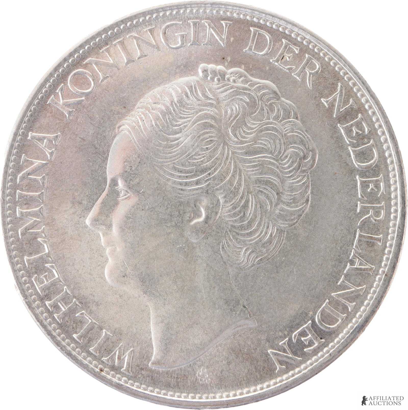1944 Curacao 2.5 Gulden Silver Mint Coin: 1944 Curacao 2-1/2 Gulden Silver Coin. Weight 25 grams. Obverse shows a portrait of Wilhelmina facing left surrounded by lettering. Rosette below head. Reverse shows the coat of arms of the Netherland