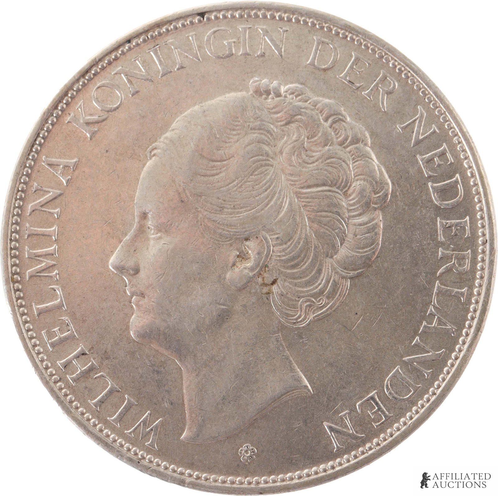 1937 2.5 Gulden Wilhelmina Silver Mint Coin: 1937 2-1/2 Gulden Wilhelmina Silver Coin. Weight 25 grams. Obverse shows the head of Queen Wilhelmina facing left. Reverse shows the Crowned Dutch arms dividing the value. Metal: .720 Silver Country