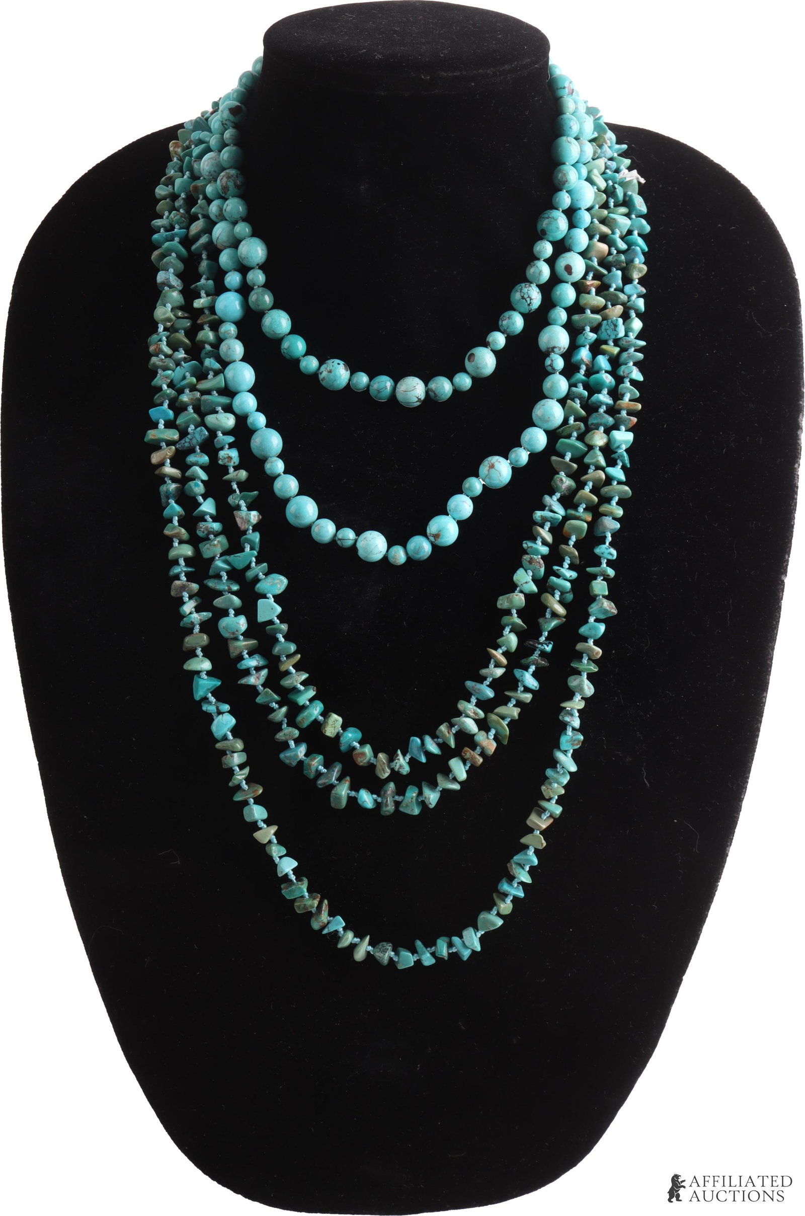 Three Turquoise Necklaces: A lot of three pieces of turquoise jewelry, including a round bead necklace measuring 20 inches, a smaller round bead necklace measuring 16 inches, and a large rough-cut bead necklace measuring 7 feet