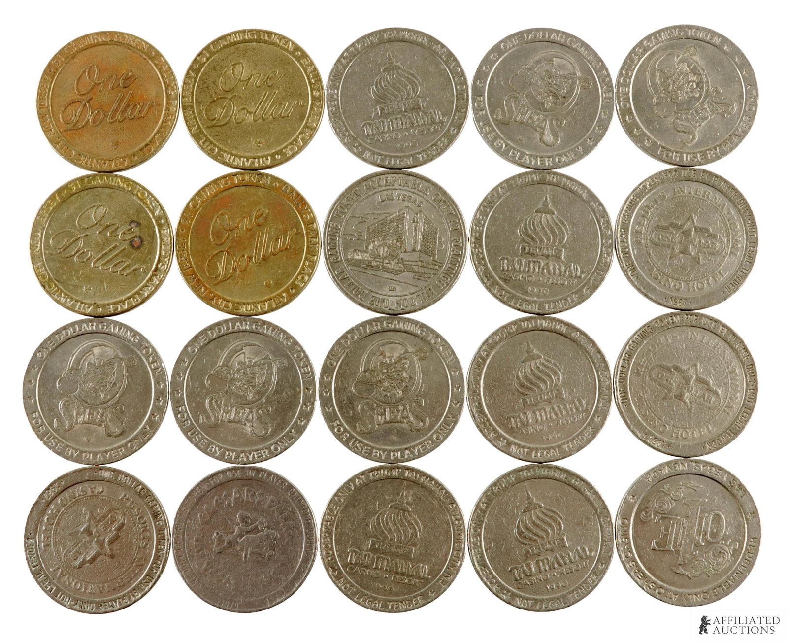 $1 Casino Gaming Token Trump Taj Mahal Lot of 20: Lot of twenty (2) metal $1 casino gaming tokens. Includes five 1990 Trump Taj Mahal Atlantic City, NJ, six O'Shea's Las Vegas, NV (undated), four Bally's Park Place Atlantic City, NJ, three 1987 Resor