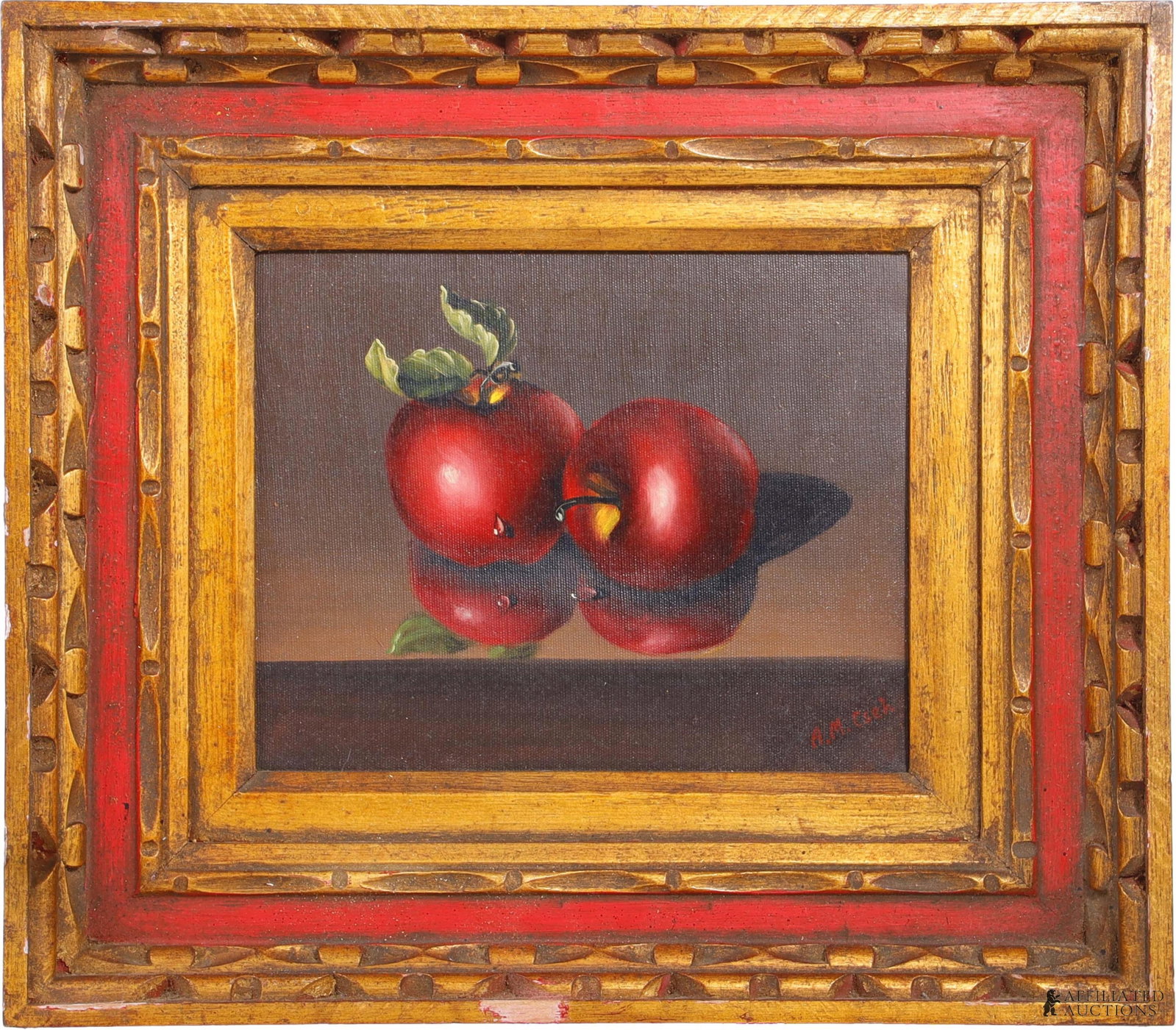 A. M. Cseh Still Life Painting of Two Apples: A still life of two apples, by Austrian artist Annmarie Cseh. In a rustic and gilt red frame. With frame, total size is 16.5x14.6 inches.