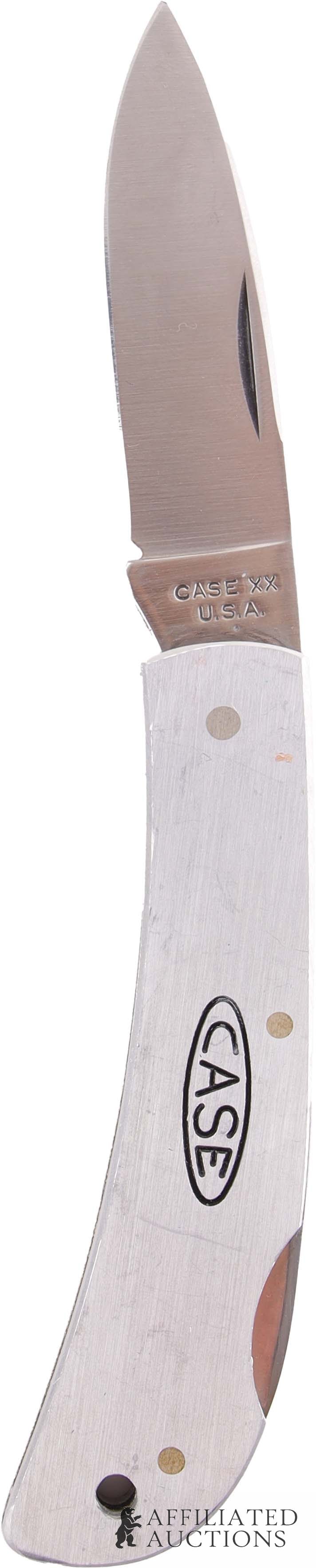 1979 Case XX M1051 LSSP Lockback Folding Knife: Case XX M1051 LSSP aluminum lockback folding knife. Blade length 2-3/4 inches. Overall length closed 3-5/8 inches.