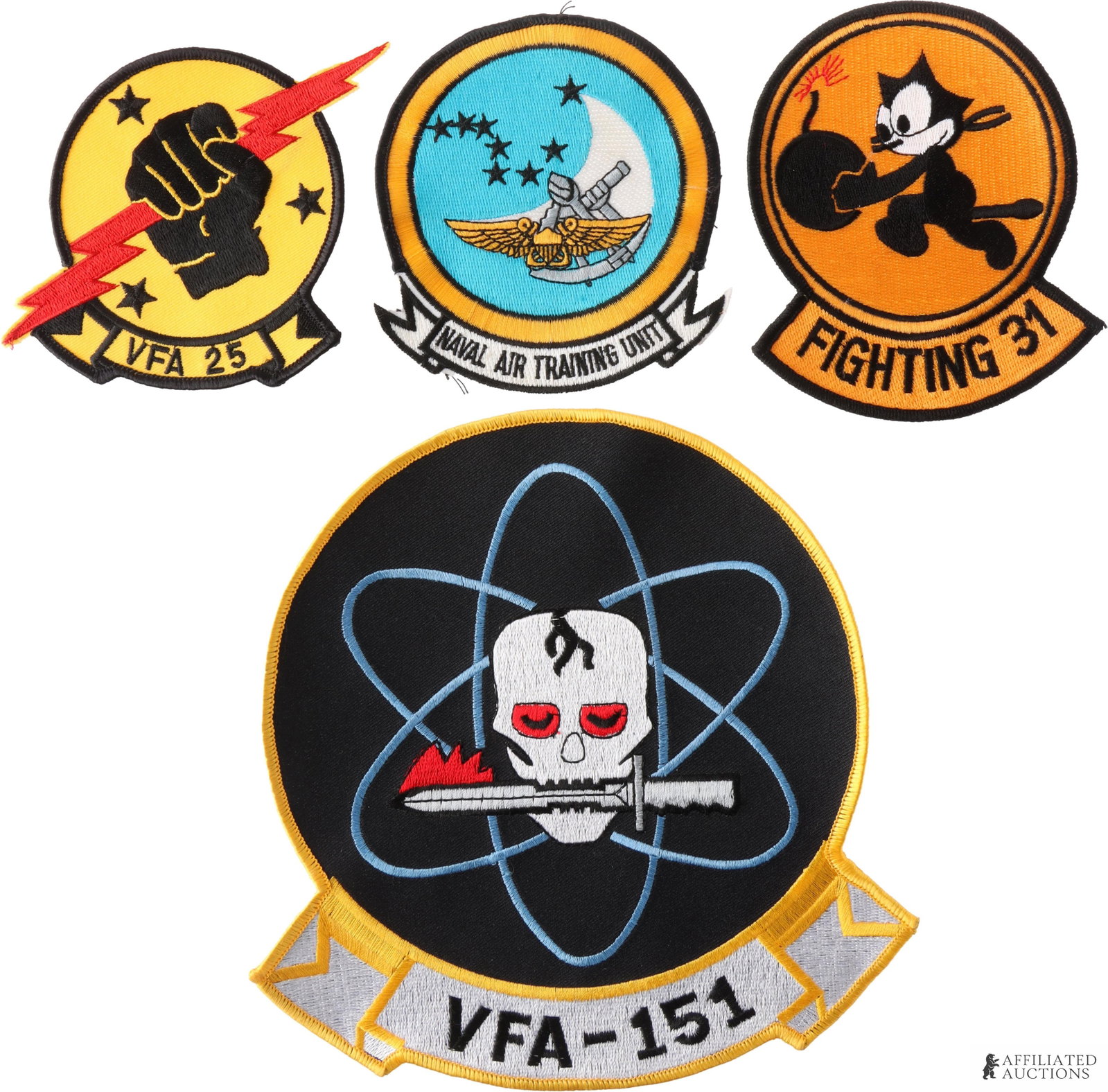 Vintage Fighter Squad Insignia Patches Lot of 4: A lot of four vintage US Navy Strike Fighter Squadron patches, all in excellent condition. Includes the following: 1) one large VFA-151 "Vigilantes" patch with iconic skull insignia that has been in u