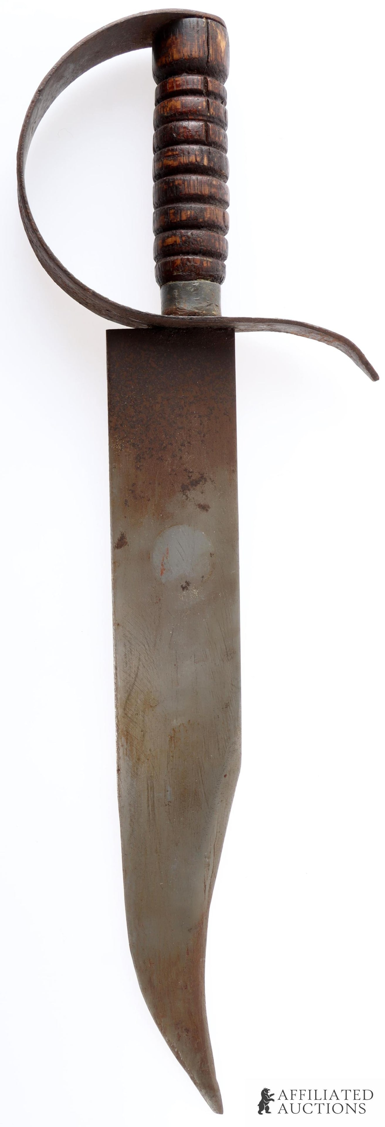 Confederate Style D Guard Bowie Knife: Steel blade with iron 'D' guard and ribbed wooden grip. Housed in leather sheath. It measures 17 1/2 X 2 inches.