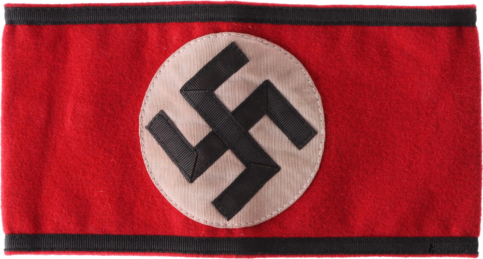 SS Armband WWII German Third Reich Militaria: Allgemeine-SS swastika armband. Measures 9 x 4.75 inches. Multi-piece construction, red wool. | This lot has a reserve.