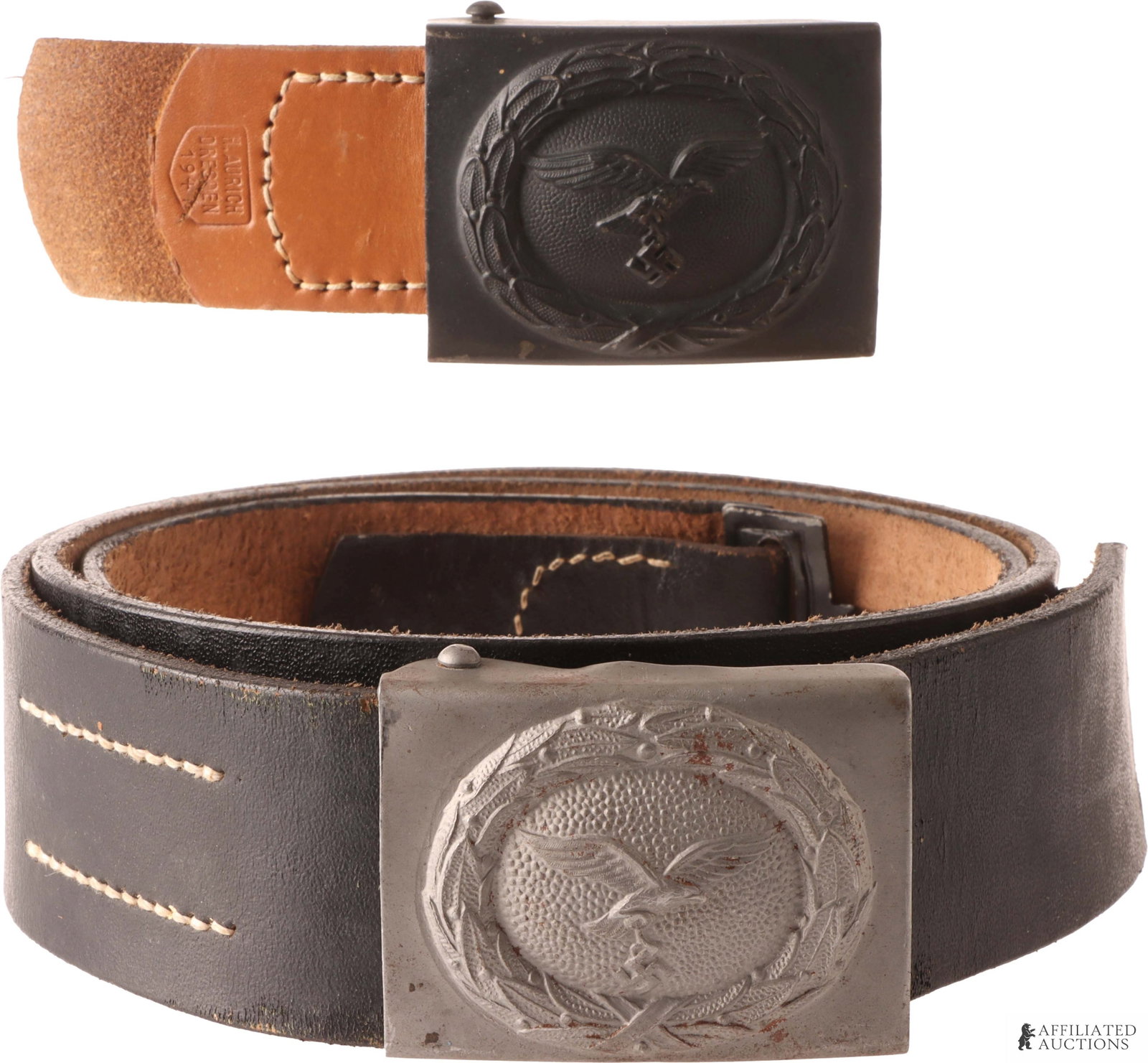 WWII German Luftwaffe Belt Lot of 2: Lot of two (2). Historical interpreter's Luftwaffe belt buckle set. Includes leather belt with Luftwaffe buckle, as well as additional Luftwaffe buckle on leather tab.