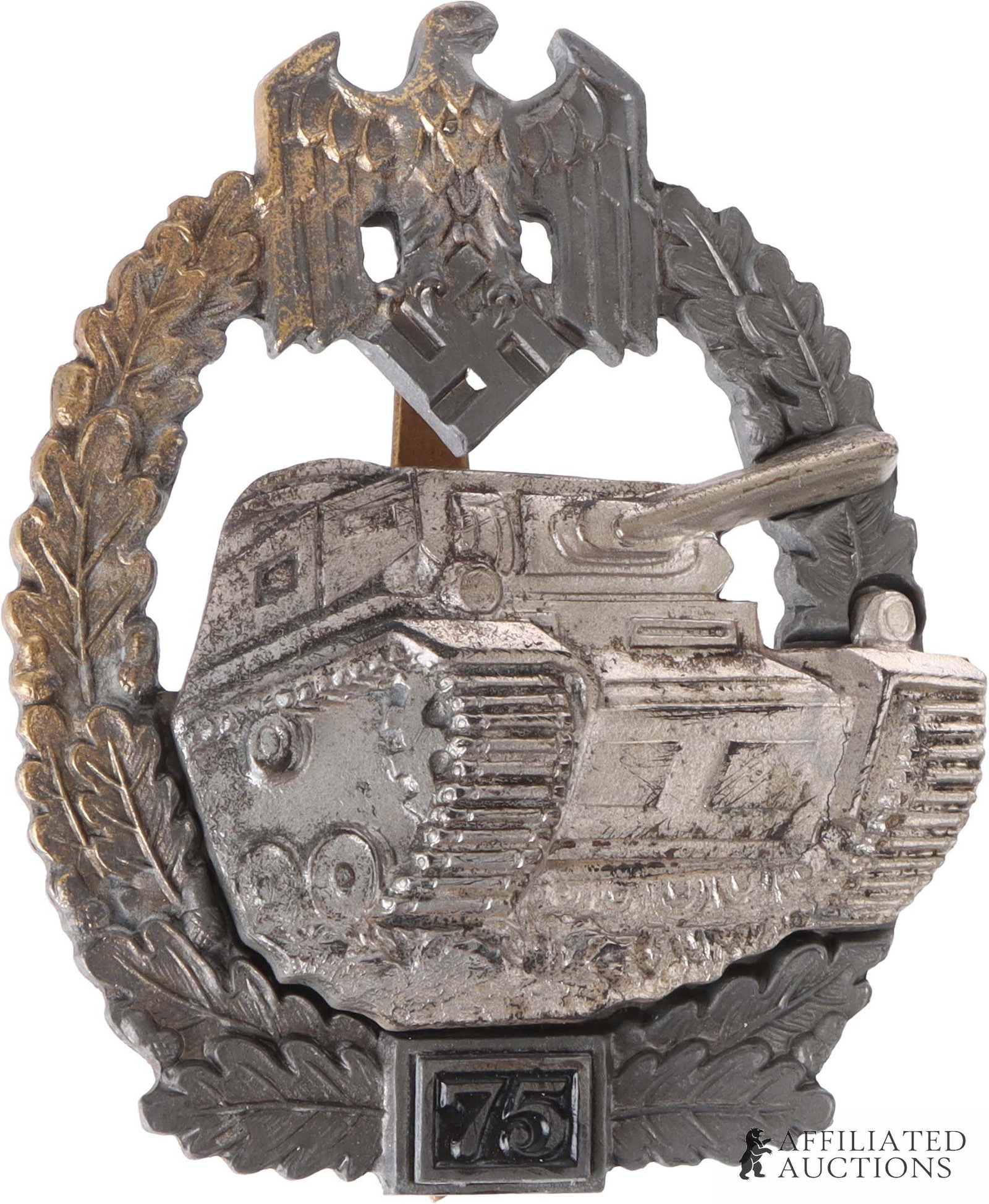 Panzer Assault 75 Engagements Badge Josef Feix: WWII German Panzer Assault 75 Engagements Badge. Solid-struck of zinc. Gilt wreath with semi-hollow panzer attached via two domed rivets. Reverse has tapered vertical pin with crimped flat wire catch.