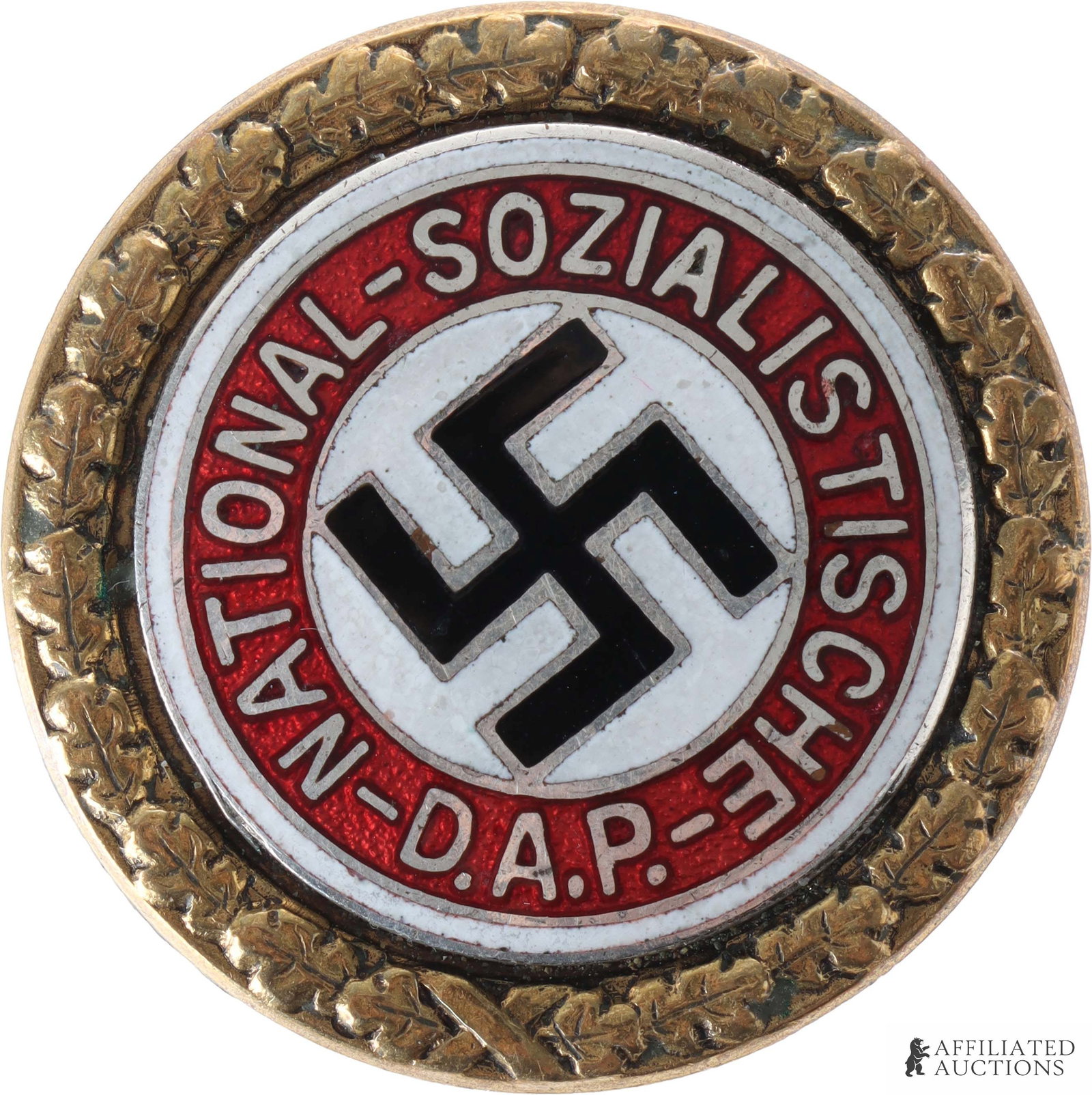 NSDAP Party Pin Full Size Deschler & Sohne WWII: A gold-colored NSDAP party pin, marked on reverse 'GES. GESCH. DESCHLER & SOHNE MUNCHEN 9' and '8106'. Has a diameter of 1.25 inches. | This lot has a reserve.
