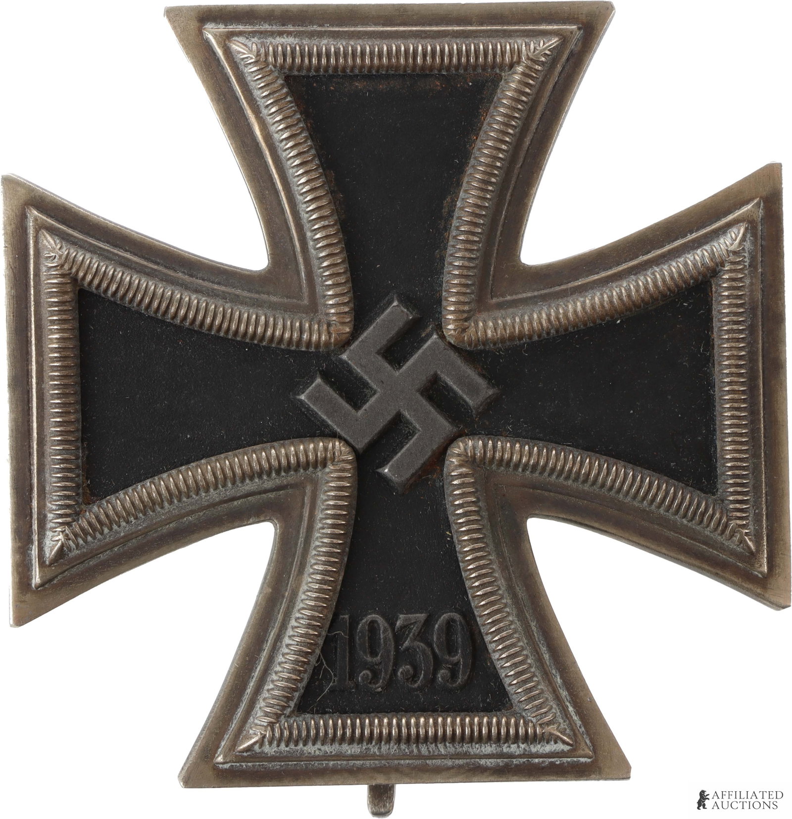 WWII German Iron Cross First Class Steinhauer: Iron Cross first class by Steinhauer. Two piece frame with magnetic iron core. Pin is marked "4" for maker. It measures 44.5mm. | This lot has a reserve.