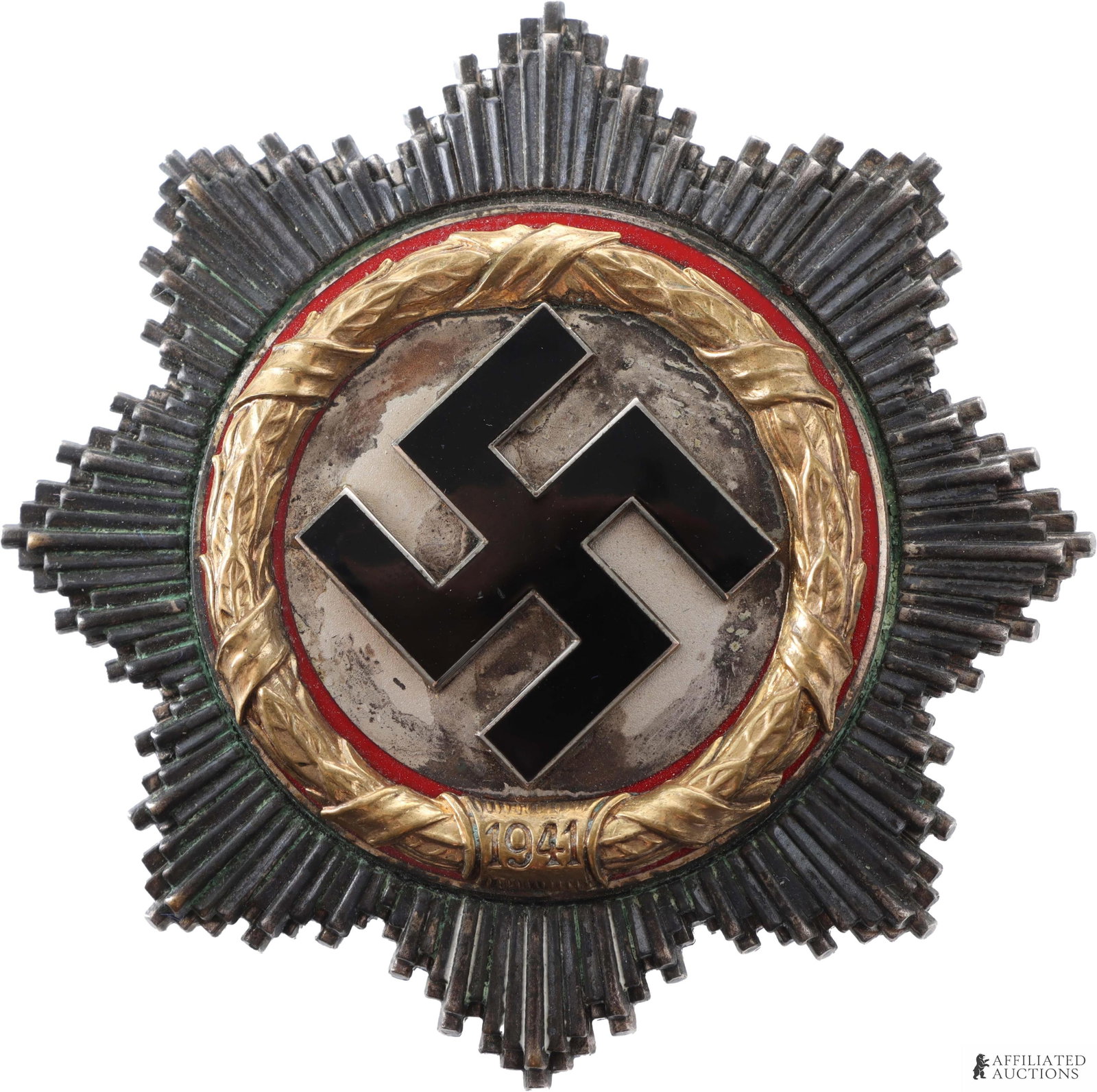 Cased German Cross in Gold WWII German: War Order of the German Cross (Deutches Kreuz) in gold. Reverse has three hollow rivets and tapered vertical pin. Pin marked "28." Width 65.3mm. Height 65.15mm. Gross weight 68.5 grams.