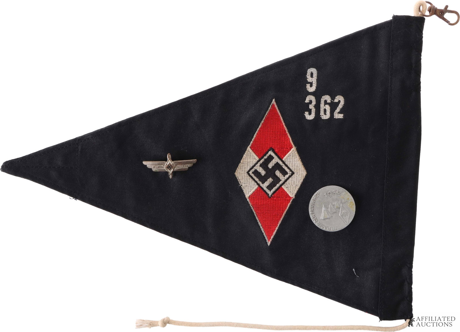 WWII German Hitler Youth Unit 362 Pennant: WWII Hitler Youth Unit 362 Pennant Dark blue with unit number machine embroidered in corner. Comes with HJ Encampment pin and HJ flying pin. Pennant measures 9in x 12in. | This lot has a reserve.